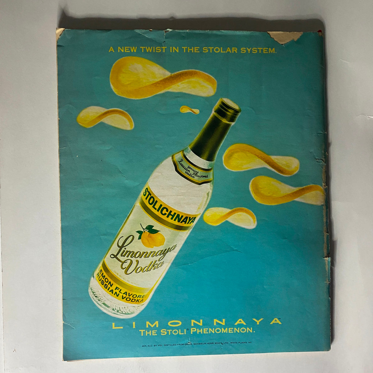 Back cover advertisement from Spin Magazine September 1992 for Stolichnaya Vodka, with a bright blue design featuring the product.