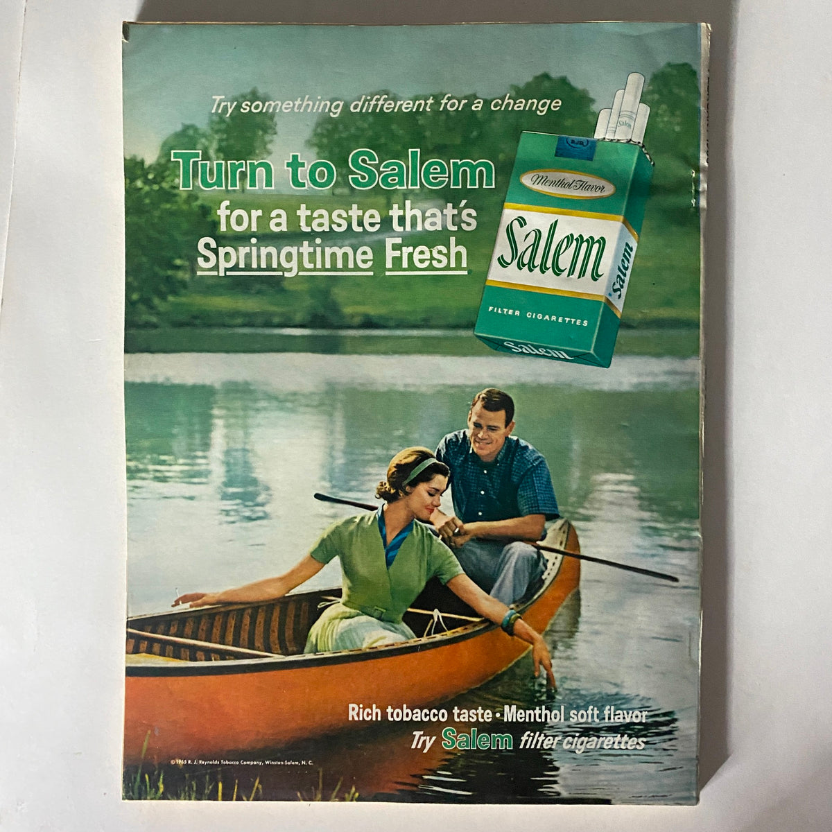 Vintage advertisement from VTG Redbook Magazine February 1966 promoting Salem filter cigarettes with a couple in a canoe, highlighting a 'Springtime Fresh' taste.