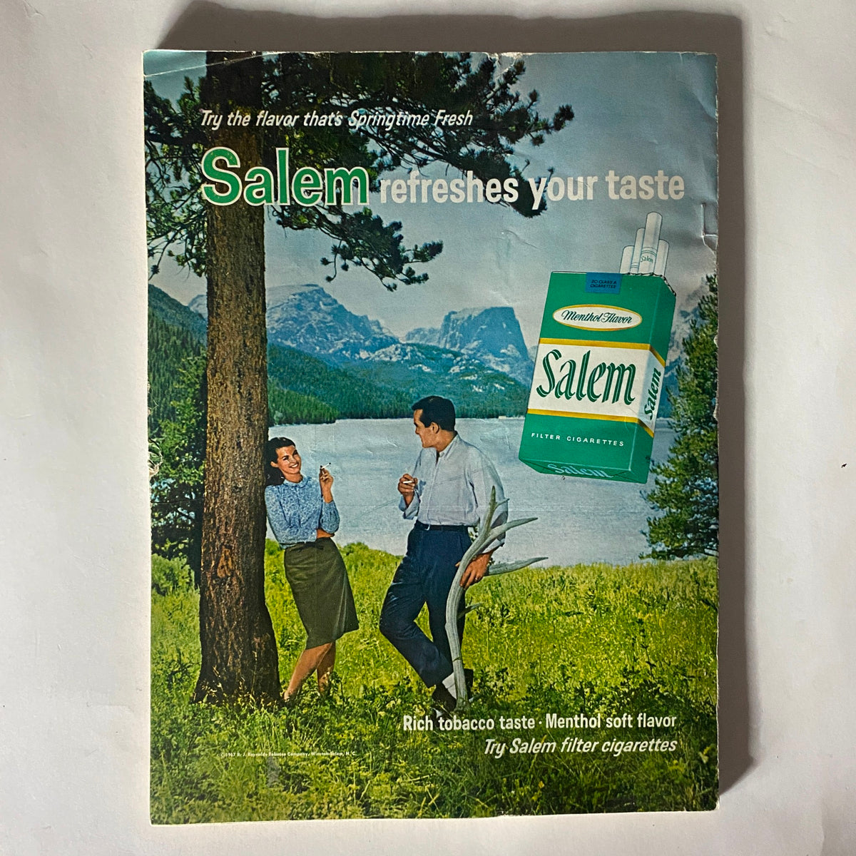 Vintage advertisement for Salem cigarettes appearing in the VTG Redbook Magazine June 1967, featuring a couple outdoors enjoying nature.