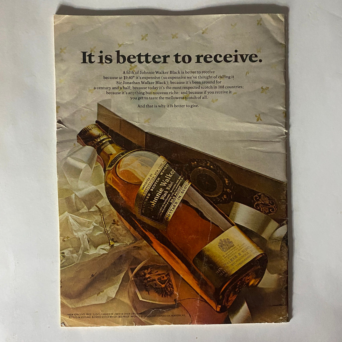 Advertisement in VTG The Reporter Magazine December 28 1967 showcasing a bottle of Johnnie Walker Black whiskey with a festive message.