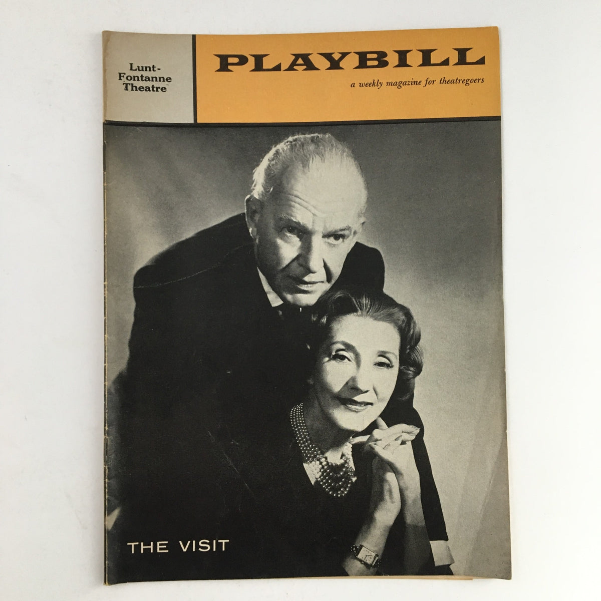 Cover of the 1958 Playbill for The Visit starring Alfred Lunt at Lunt-Fontanne Theater, featuring classic black and white portrait of Lunt and Lynn Fontanne.