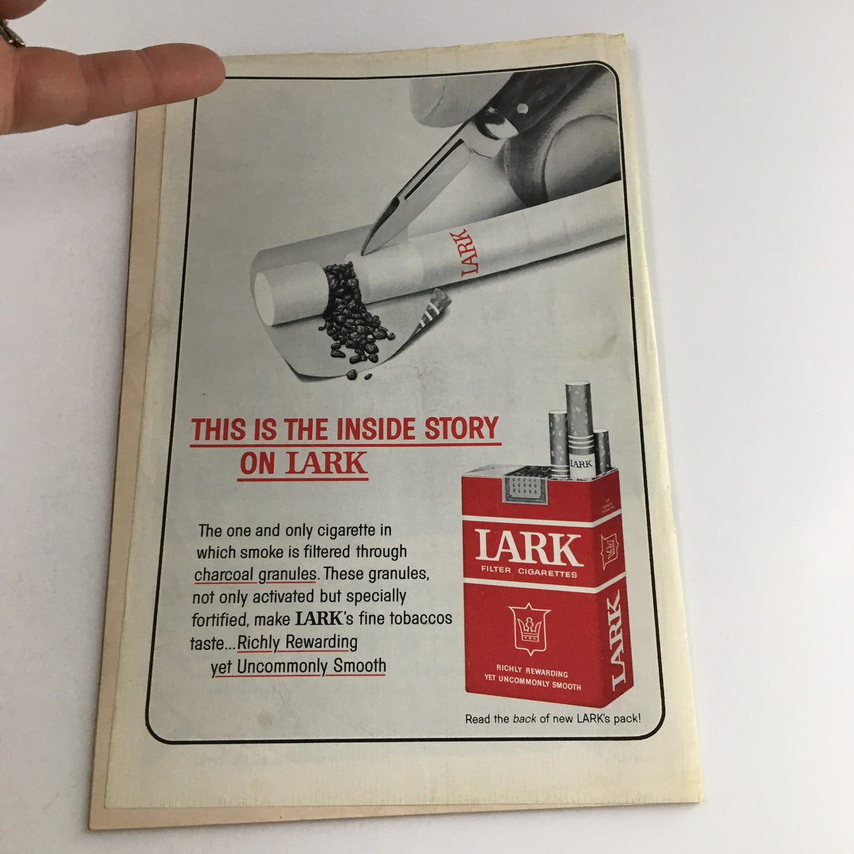 1963 Playbill for A Case of Libel, featuring an advertisement for Lark cigarettes, highlighting unique tobacco filtering.