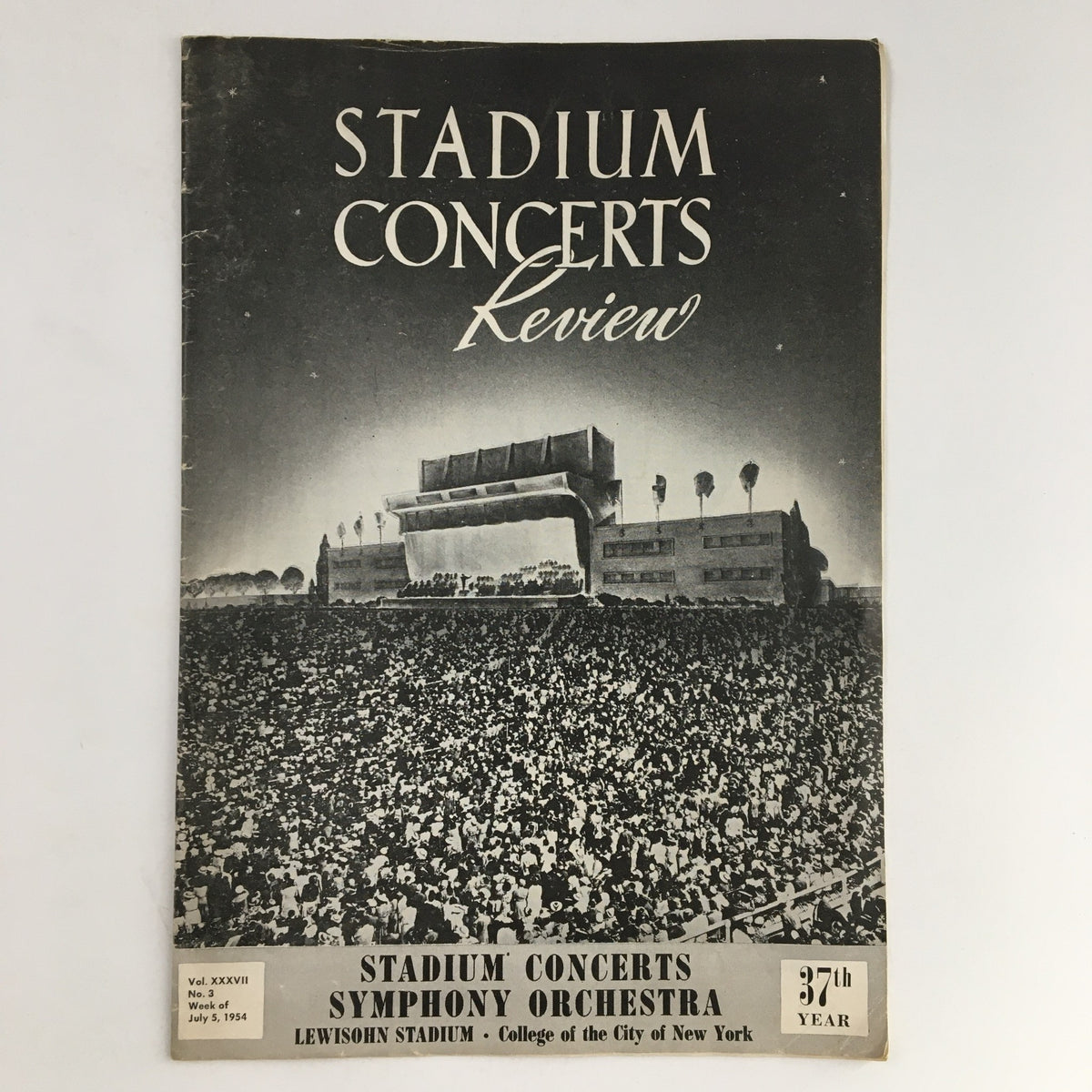 Cover of the 1954 Stadium Concerts Symphony Orchestra Review of The Three-Cornered Hat featuring a large audience at Lewishohn Stadium, showcasing the vibrant atmosphere of the concert.