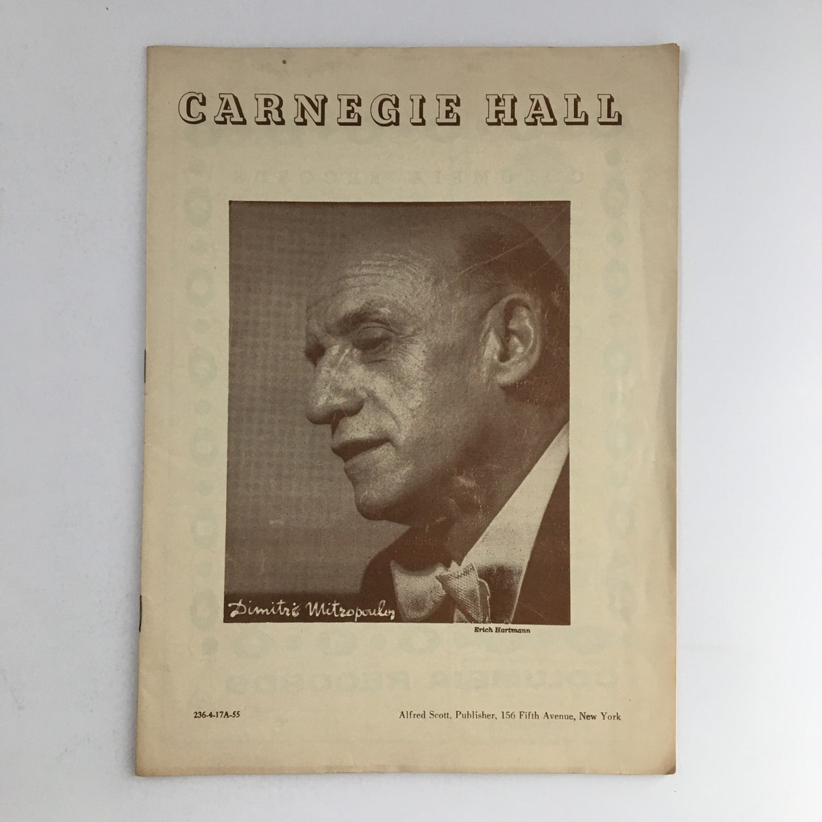 Cover of the 1955 Carnegie Hall Philharmonic-Symphony Society featuring conductor Dimitri Mitropoulos, showcasing a black and white portrait.