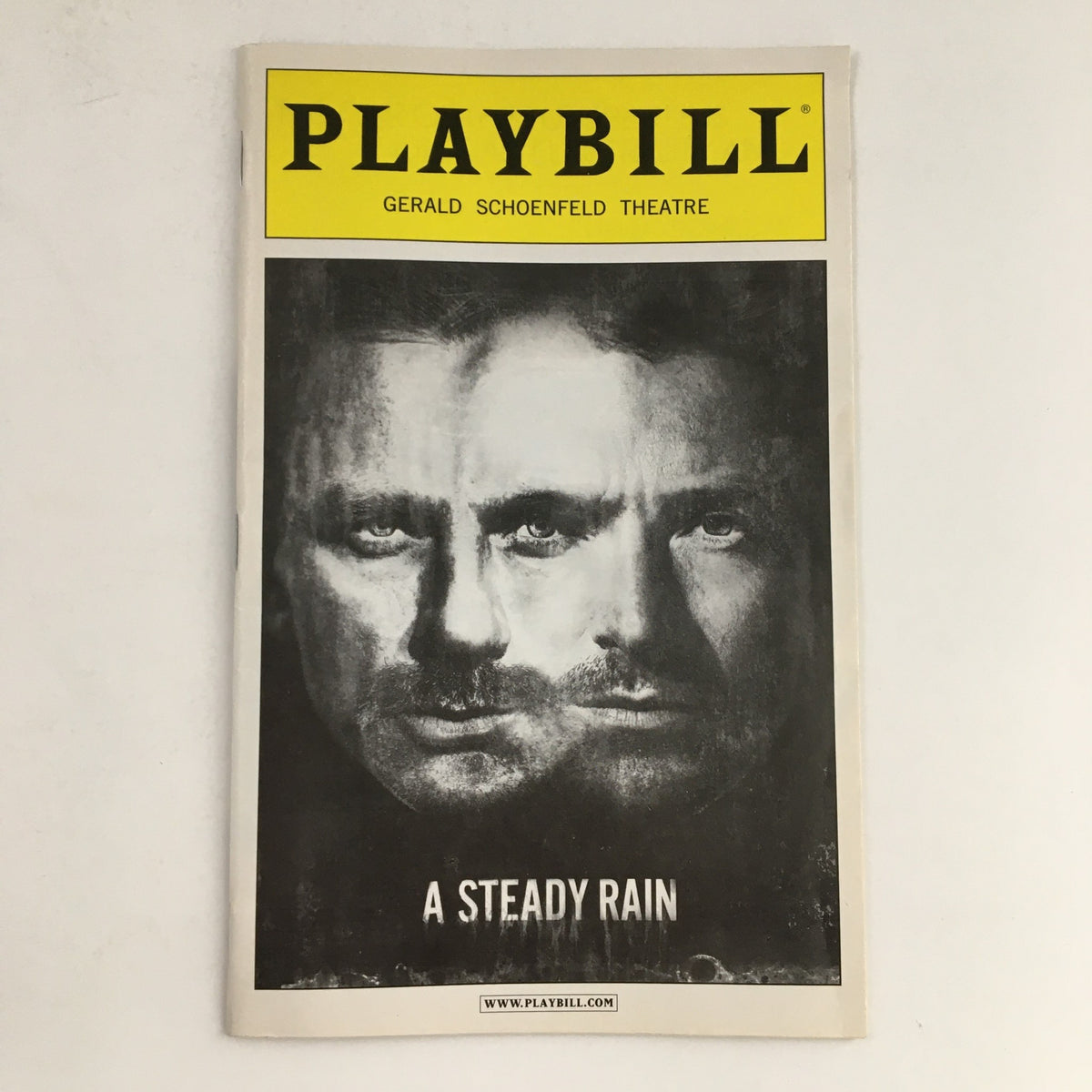 2009 Playbill for A Steady Rain at the Gerald Schoenfeld Theatre featuring the striking black and white cover image of Daniel Craig and Hugh Jackman.