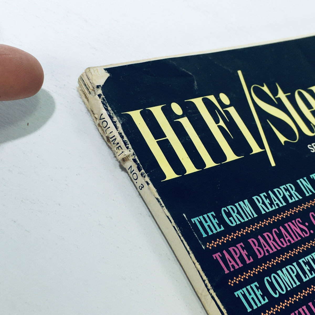 Side view of the VTG HiFi Stereo Review Magazine September 1963 showcasing the volume and issue number along with details about the content and wear from age.