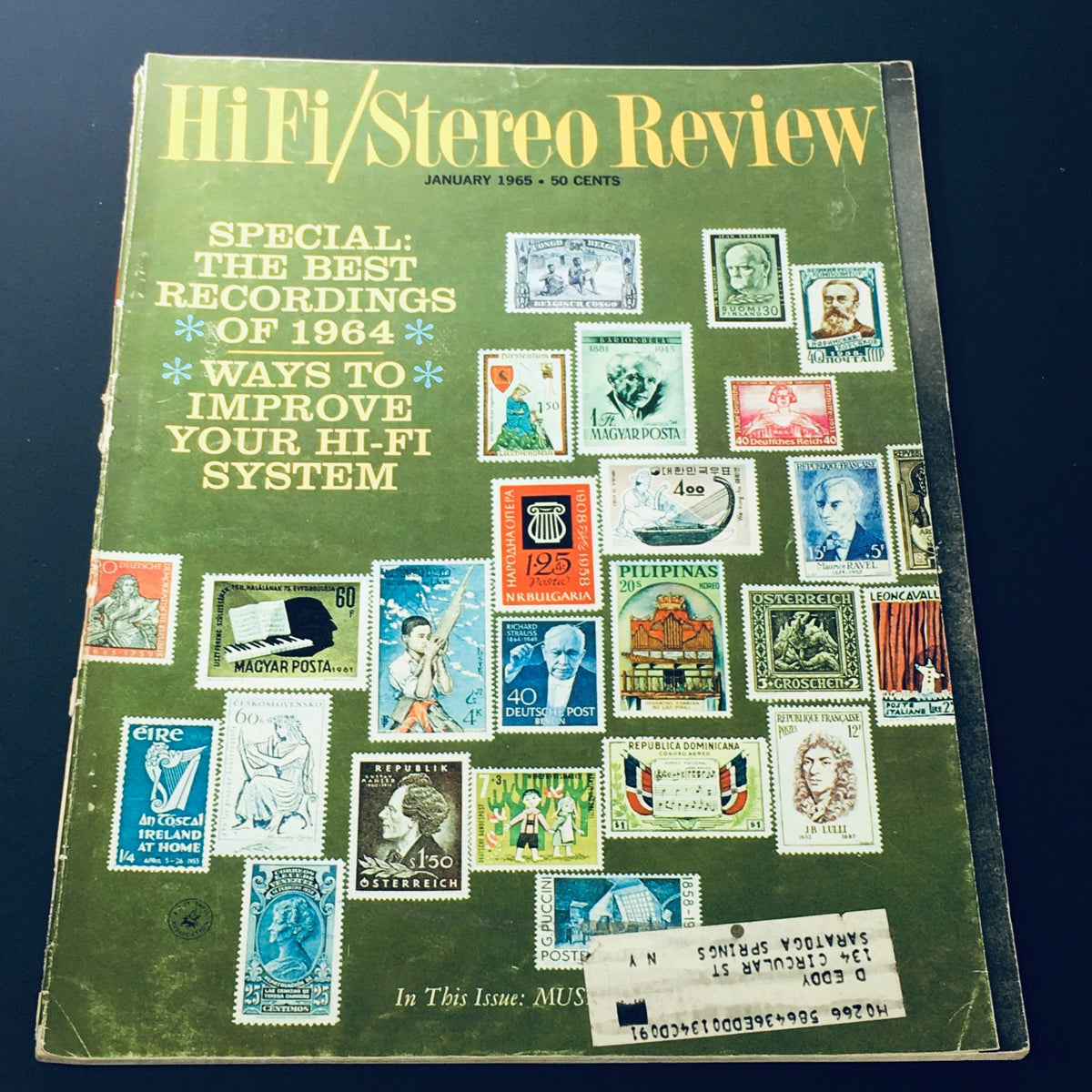 Cover of VTG HiFi Stereo Review Magazine January 1965 featuring 'The Best Recordings of 1964' and illustrations of various postage stamps, highlighting vintage audio culture.