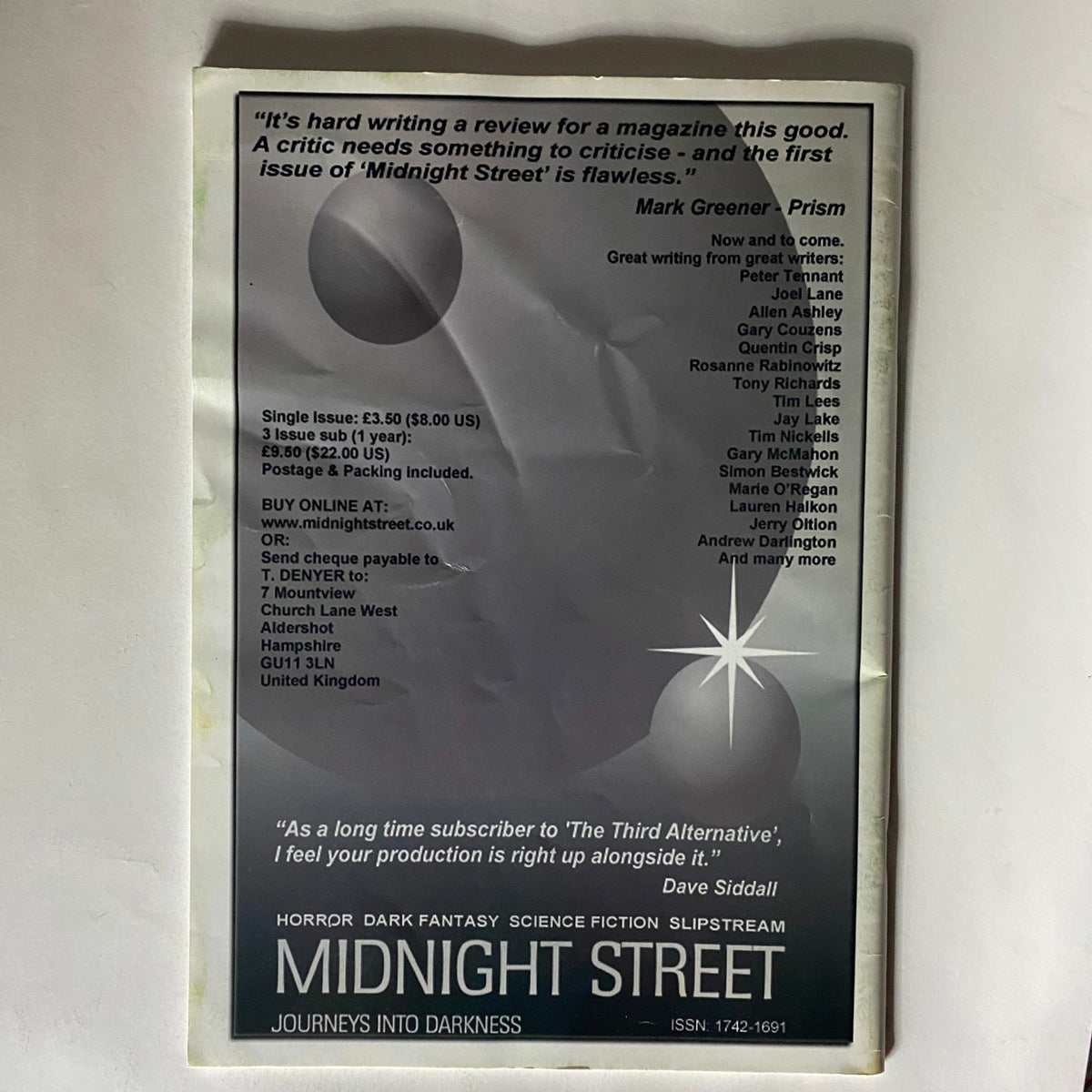 Back cover of The Horror Express Magazine Summer 2006 #5 highlighting an advertisement for Midnight Street magazine, emphasizing the connection to horror and science fiction.