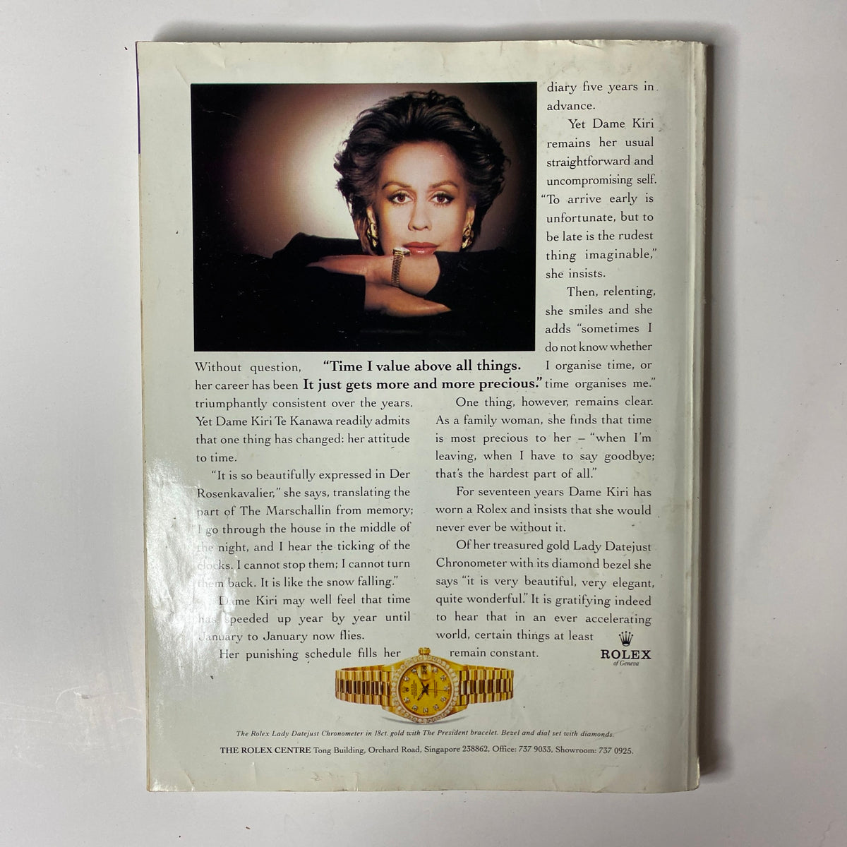 Her World Magazine March 1996 - Back cover featuring a portrait of Dame Kiri Te Kanawa with a Rolex advertisement, emphasizing elegance and timeless beauty.