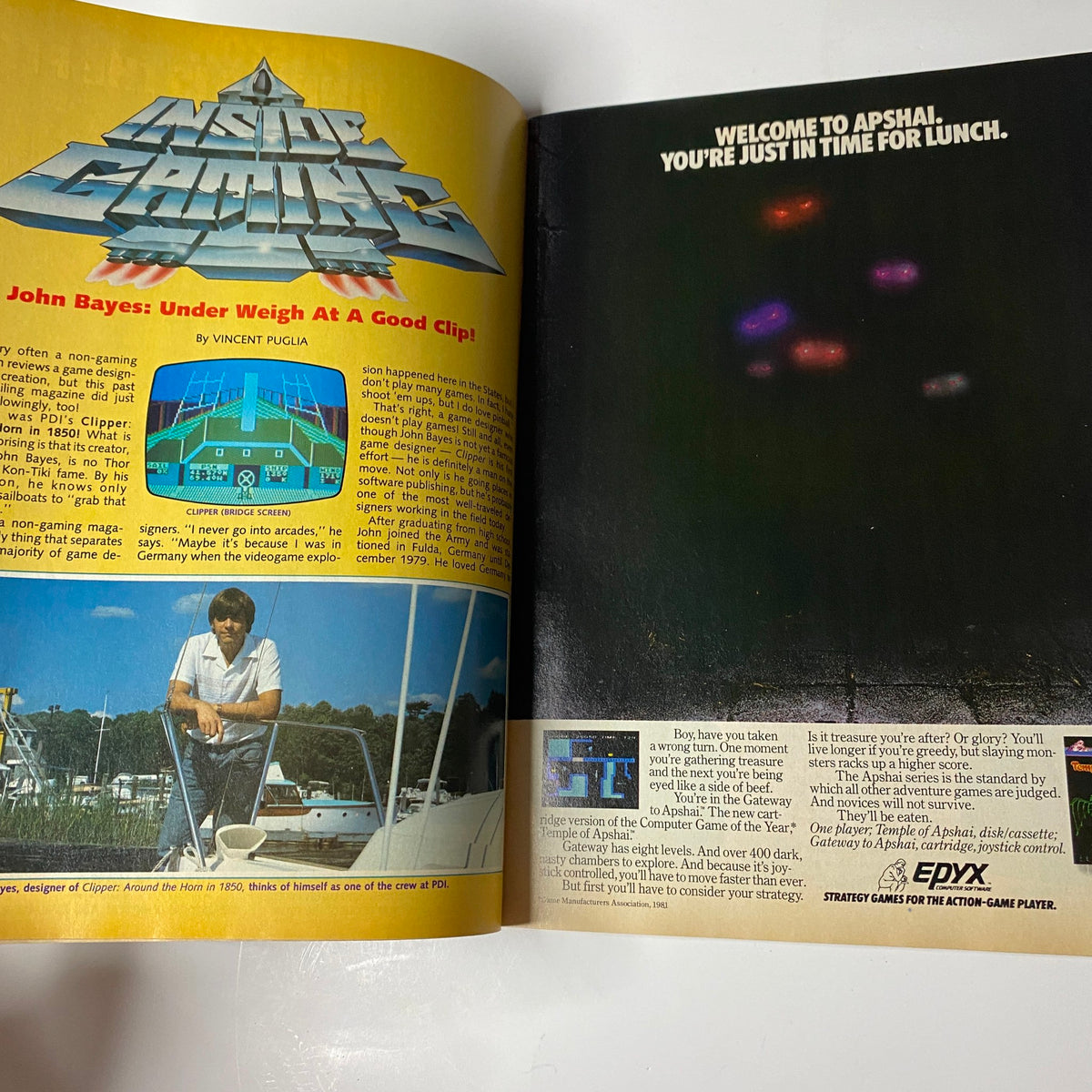 Article spread from Electronic Games Magazine December 1983 highlighting gaming news with an advertisement welcoming readers to 'Apshal'.