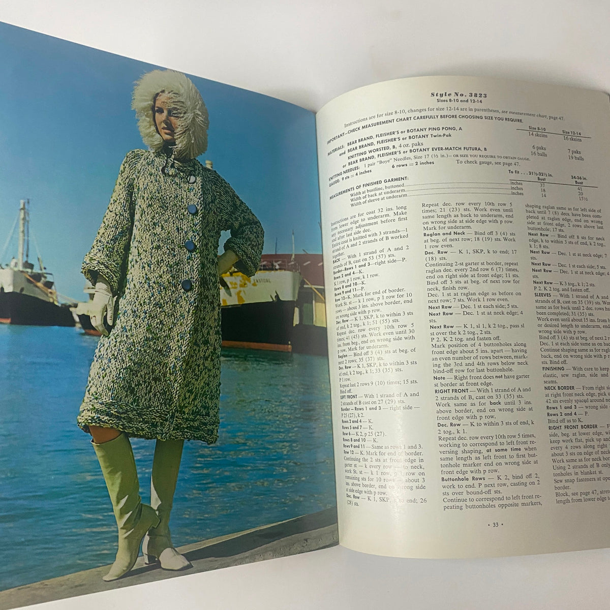 1968 Vol 38 Couture Handknits Catalog featuring a model in a stylish knit coat with fur accents, posing by a harbor, representing classic mid-century knitwear from Bear Brand, Fleisher, and Botany.