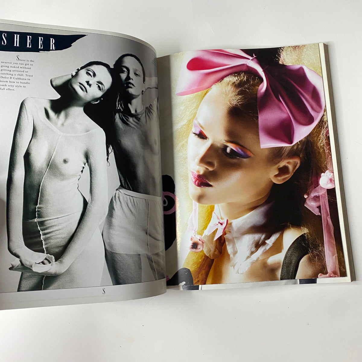 2009 First Love Spring and Summer Catalog featuring striking fashion photography of models dressed in sheer designs with bold makeup and accessories.