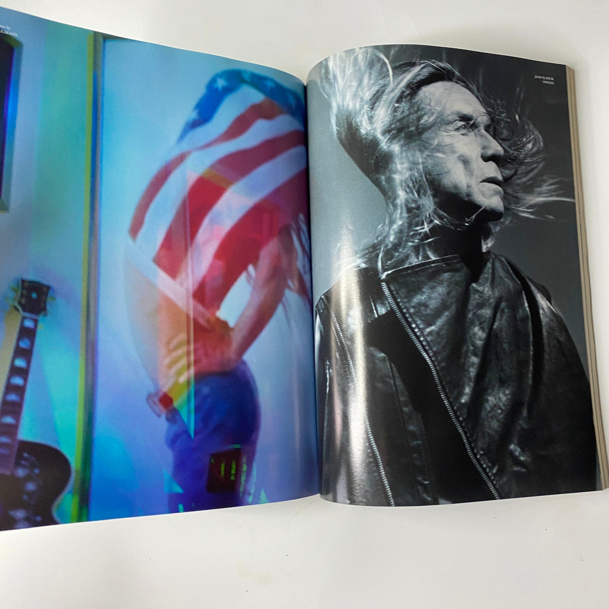 2009 First Love Spring and Summer Catalog highlighting dynamic imagery of a model with an American flag, paired with a dramatic portrait of a male model in a leather jacket.