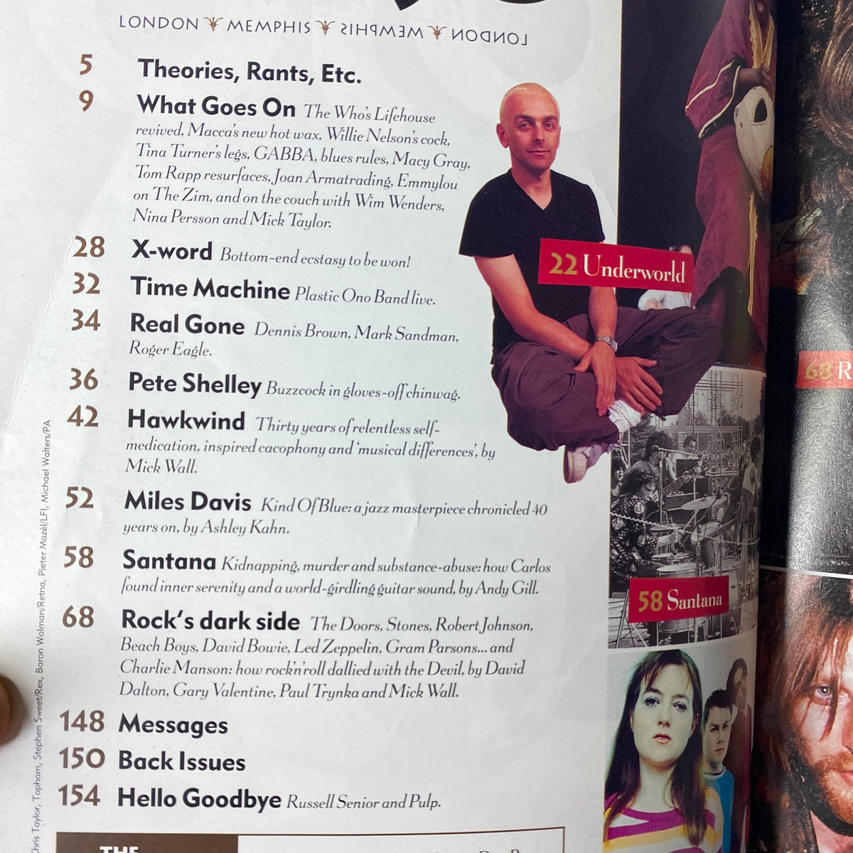 Table of contents page from Mojo Music Magazine September 1999, detailing features on artists like Miles Davis, Santana, and others under the theme 'The Dark Side'.