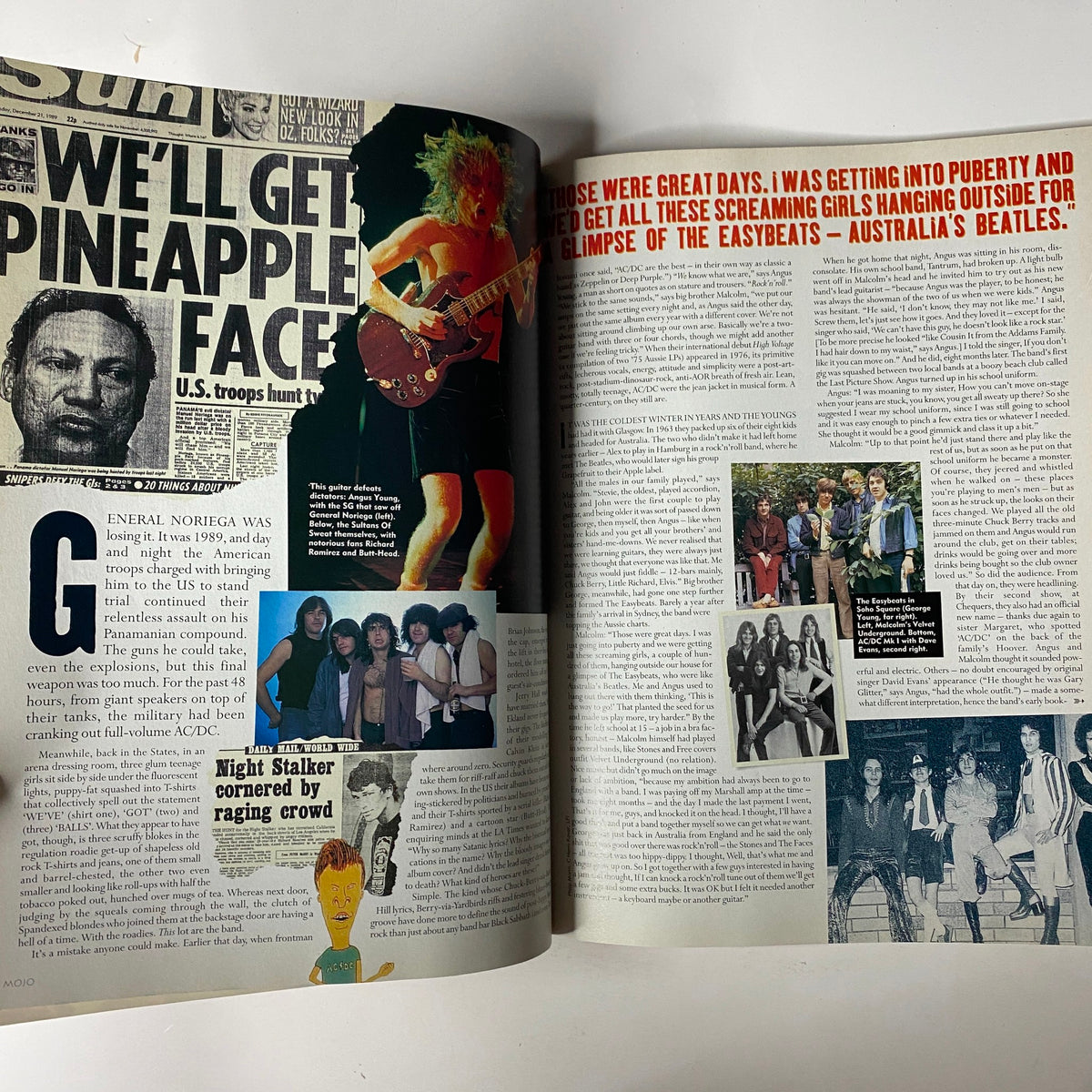 Another inside page of Mojo Music Magazine December 2000 featuring historical references and images, covering the impact of AC/DC and their musicianship with accompanying visuals.