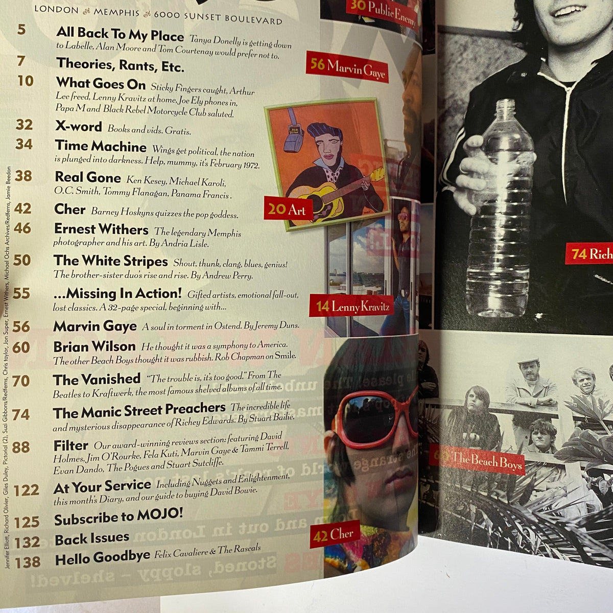 Table of contents from Mojo Music Magazine February 2002, showcasing articles on Marvin Gaye, Brian Wilson, The White Stripes, and other notable artists.