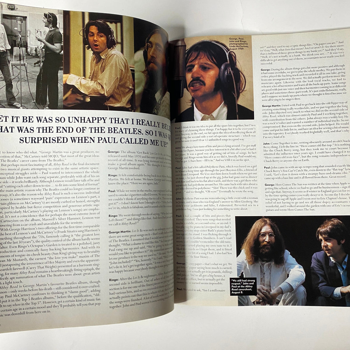 Interior spread from Mojo Music Magazine October 2000 featuring multiple images of The Beatles along with text reflecting on their history and legacy.