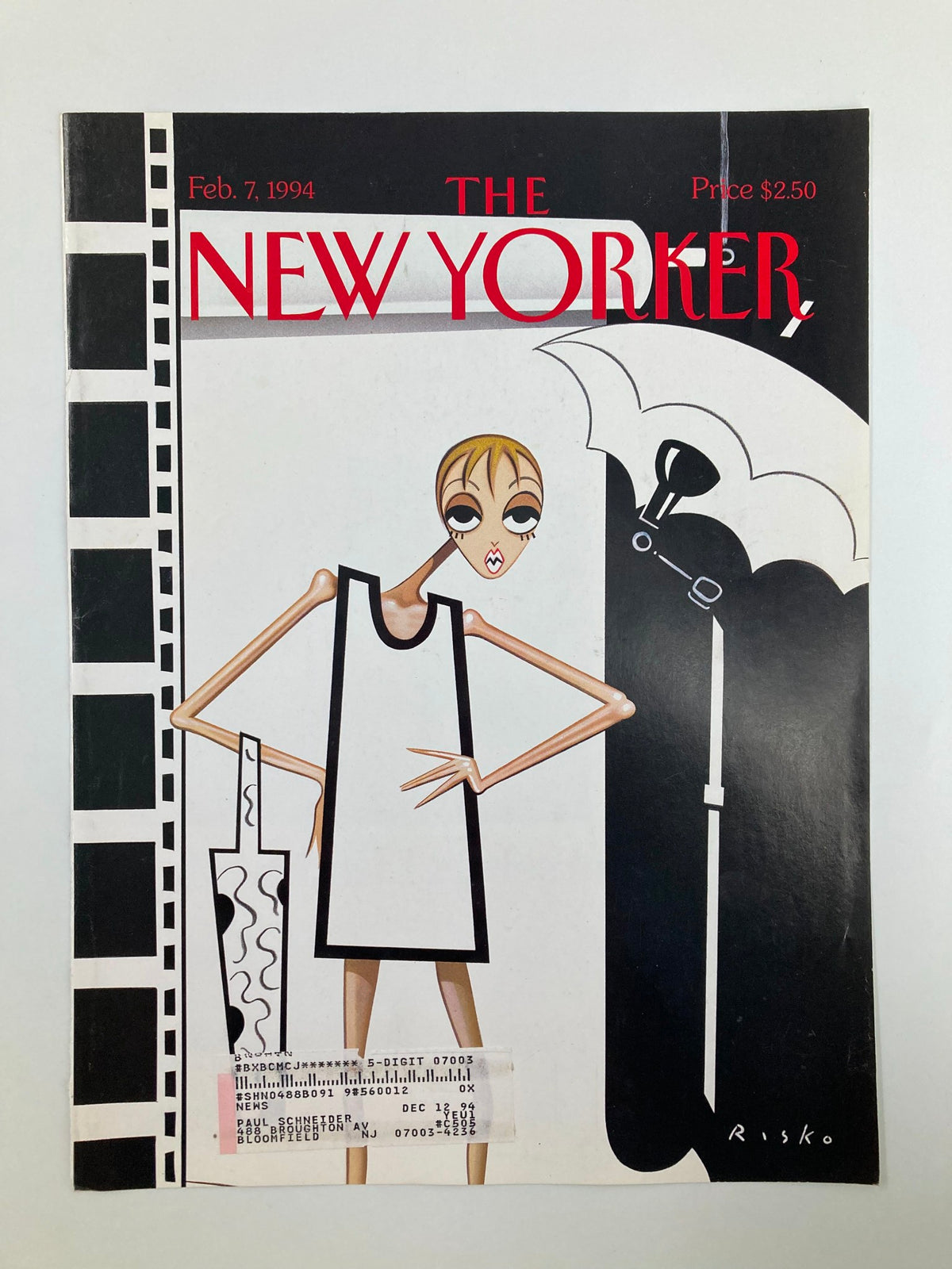 Cover of The New Yorker February 7, 1994, titled 'The Look' by Robert Risko, showcasing a striking illustration of a fashionable woman holding an umbrella.