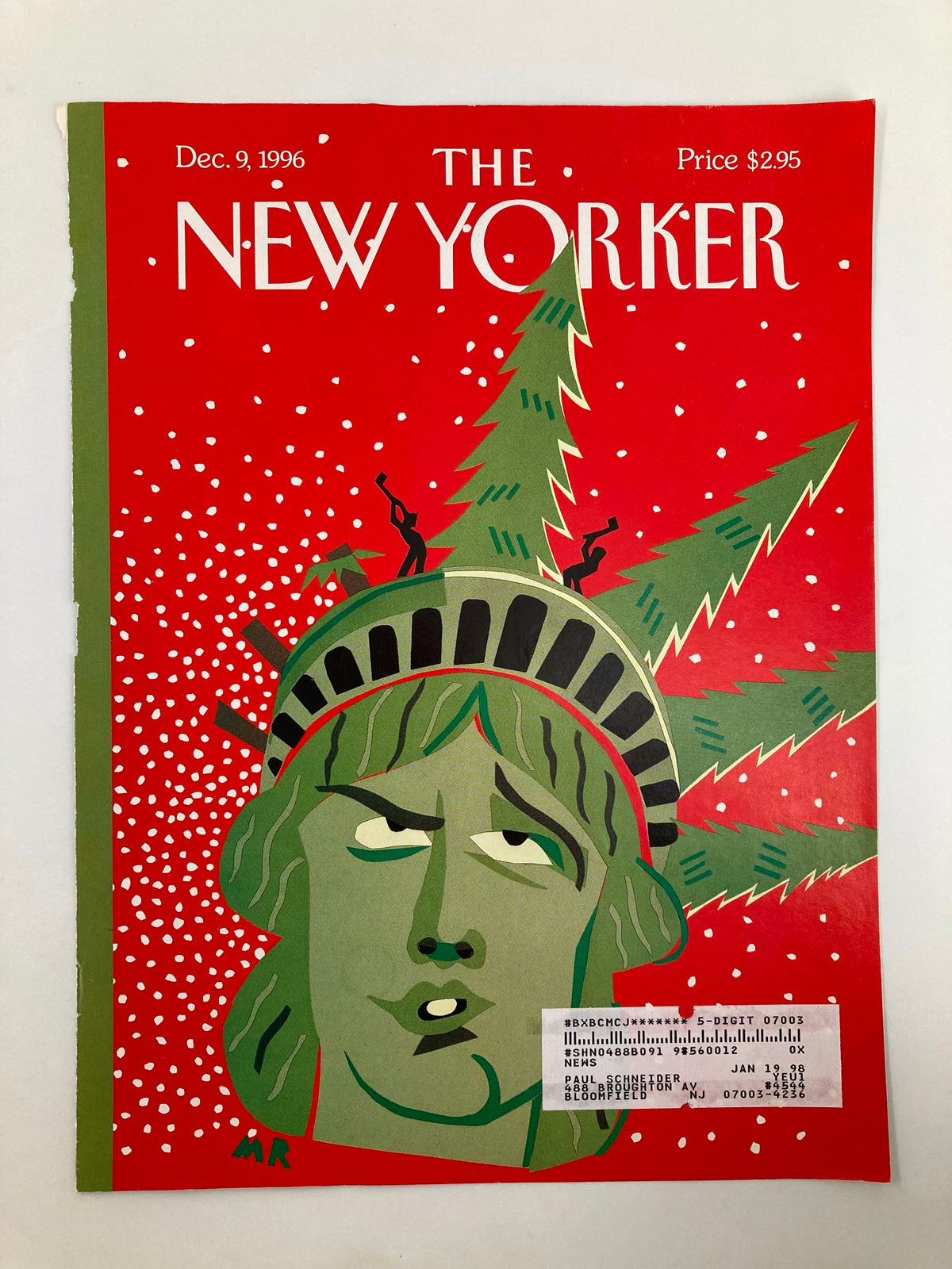 Cover of The New Yorker December 9 1996 titled Christmas Chopping showcasing a whimsical illustration of Lady Liberty with Christmas trees and snowflakes.