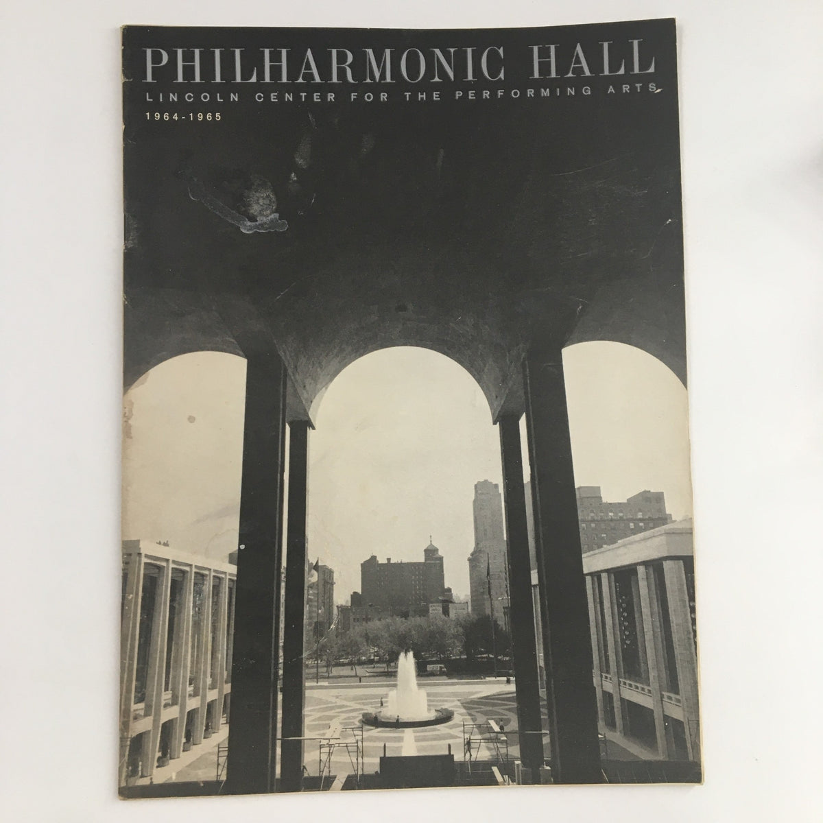 Cover image of the 1964 Philharmonic Hall Lincoln Center Present Steinberg Command Performance, showcasing a historic black and white photograph of the iconic hall and its surrounding architecture.