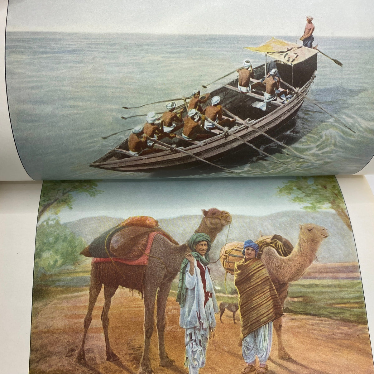 Illustration from the VTG National Geographic Magazine November 1921 depicting a boat with rowers and camels in a picturesque landscape.