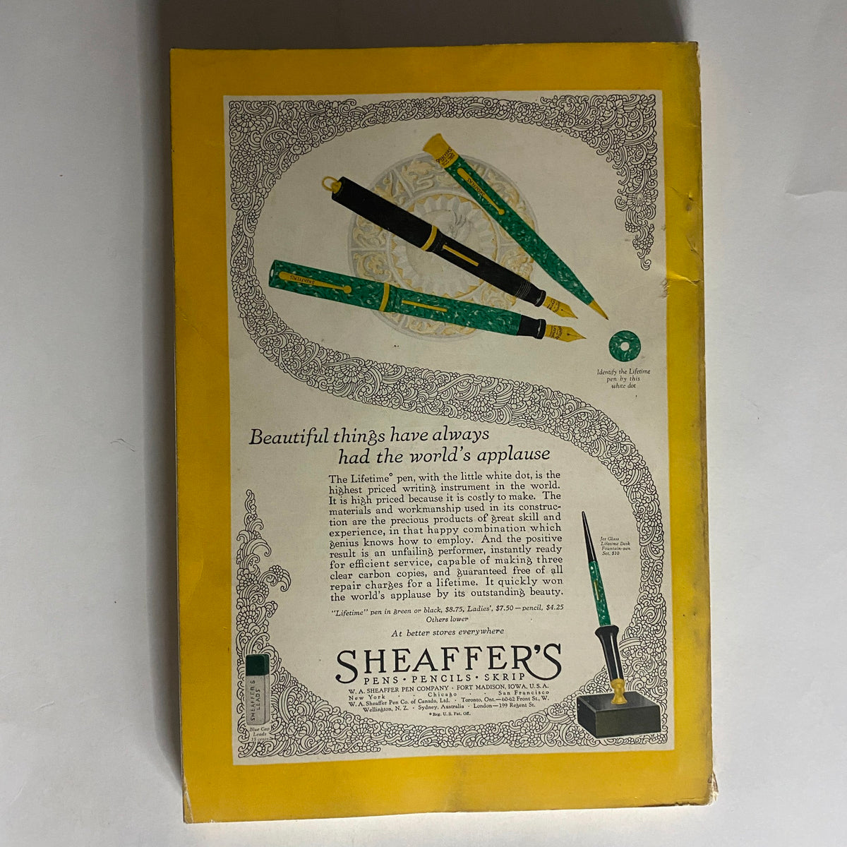 Back cover of National Geographic Magazine May 1928 featuring an advertisement for Sheaffer's pens, illustrating elegant writing instruments.