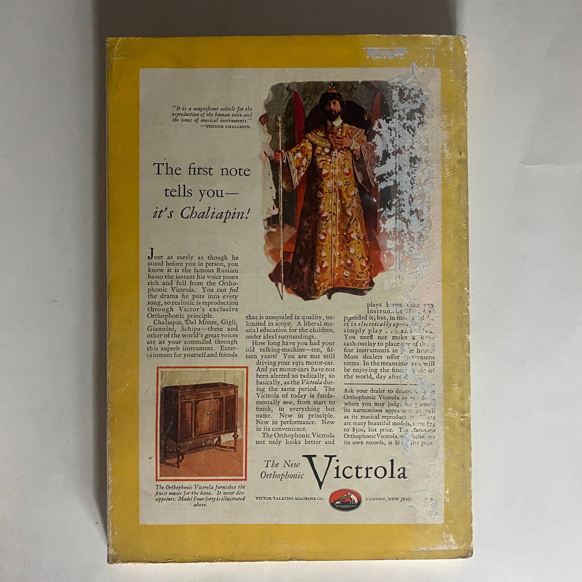 Back cover of National Geographic Magazine November 1927, featuring an advertisement with art from the era connected to the contents of the magazine.