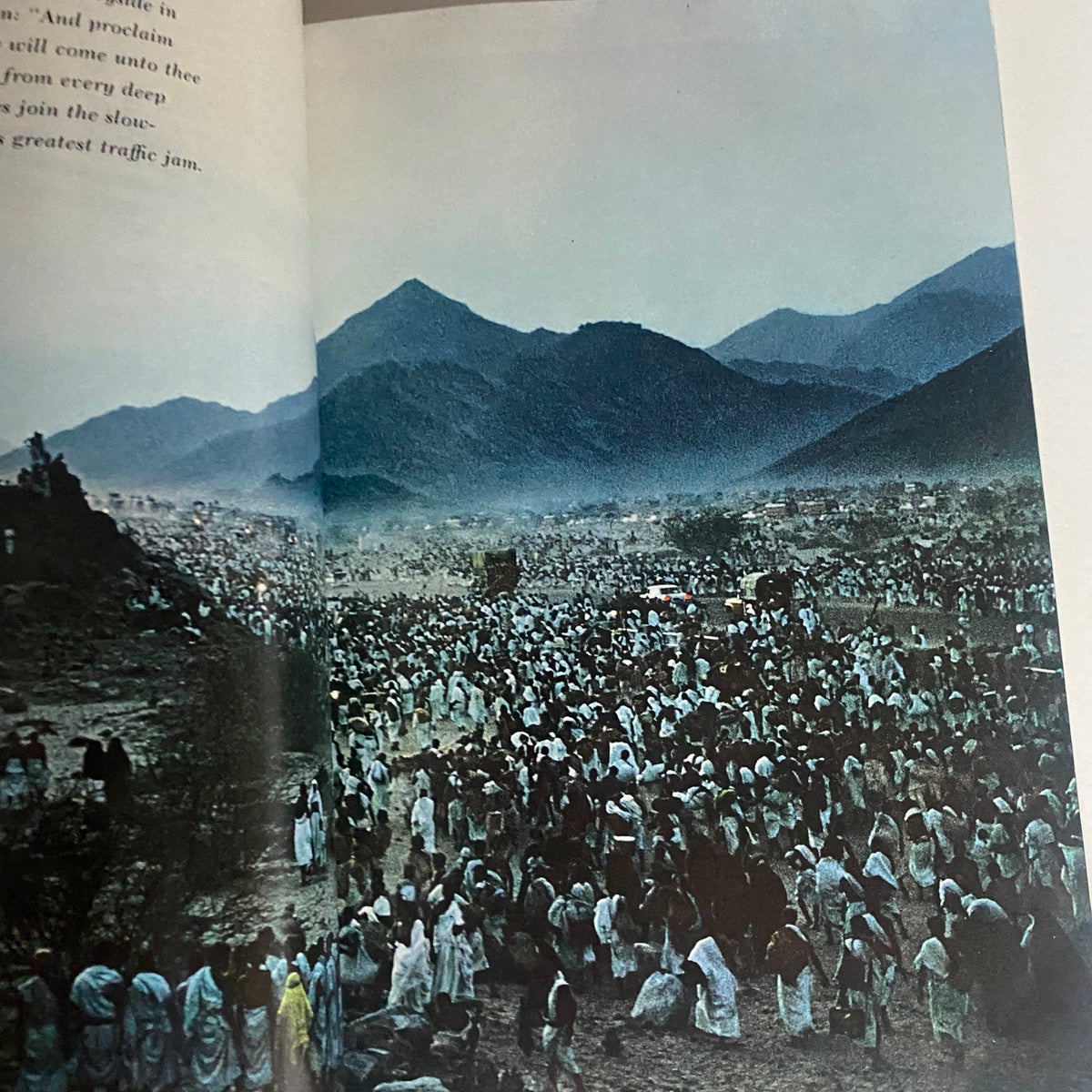 An inside page from National Geographic Magazine January 1966, depicting a large gathering in a mountainous landscape, related to cultural or historical events.