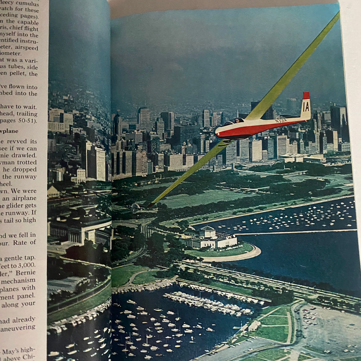 Another interior page of National Geographic Magazine January 1967, featuring a glider flying over a city skyline, illustrating advancements in aviation; part of the magazine's exploration of diverse topics.