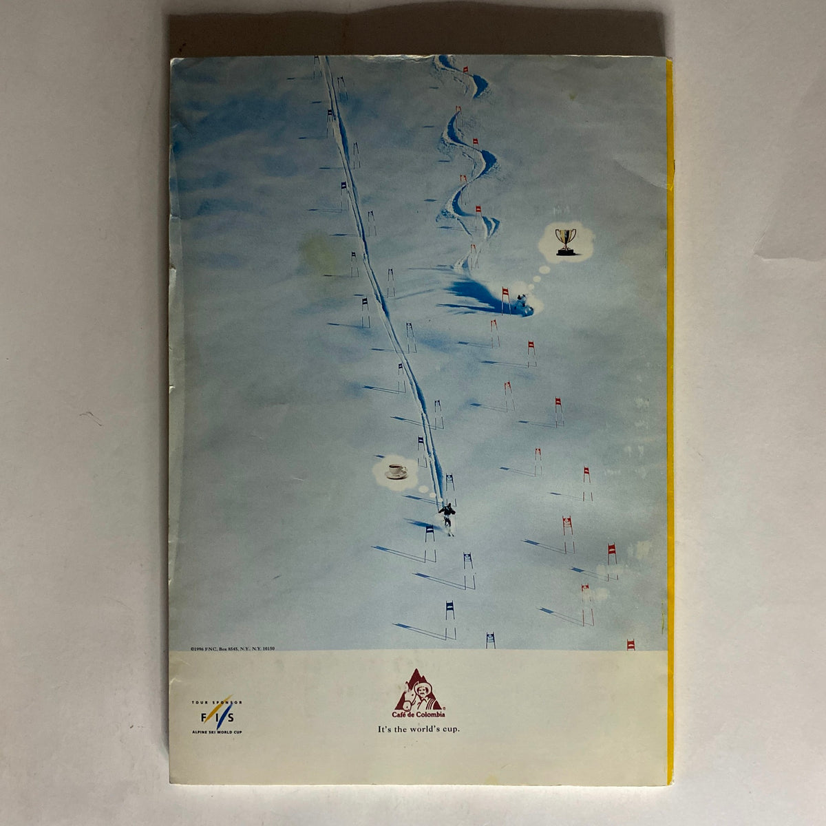 Cover of the National Geographic Magazine January 1997, showing an artistic depiction of a snow-covered landscape with ski flags, highlighting the theme 'It's the world's cup'.
