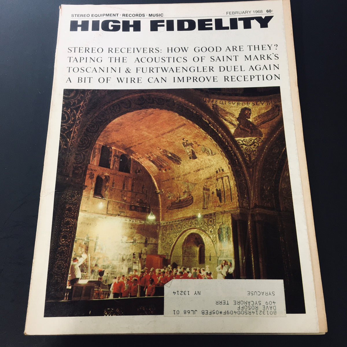 Cover of VTG High Fidelity Magazine February 1968 featuring articles on acoustic analysis of renowned conductors Toscanini and Furtwängler, showcasing an interior scene with musicians in a classical setting.