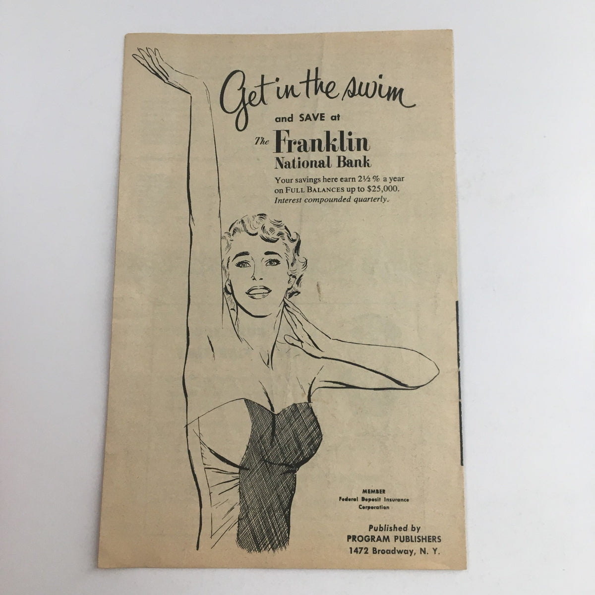 Advertisement page from the 1938 Guy Lombardo Presents Show Boat by Oscar Hammerstein, featuring a drawing of a woman promoting savings at a bank.