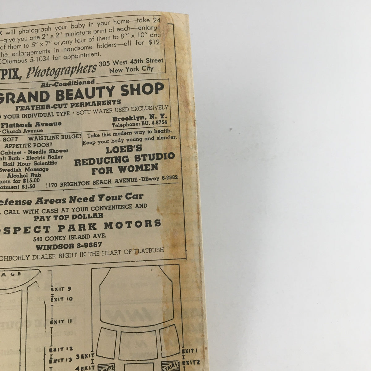 Back cover of the 1943 Flatbush Theatre Program for George Abbott's Room Service showcasing additional local advertisements and promotions.
