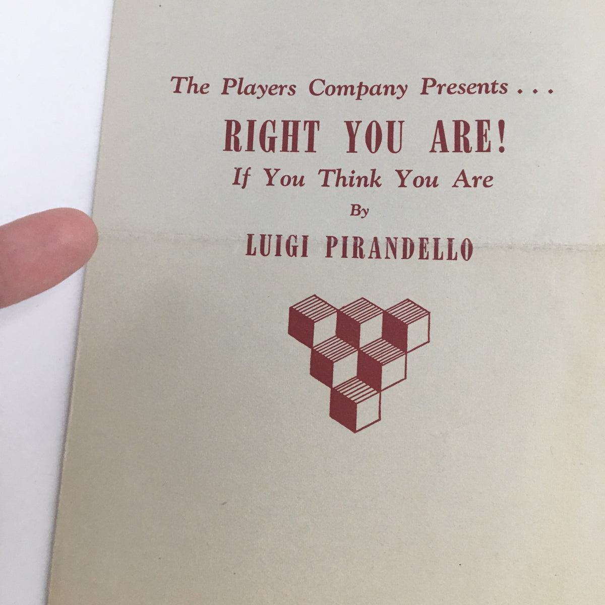 Interior view showing the cover of 'Right You Are If You Think You Are' by Luigi Pirandello, published in 1966 by The Players Company, with a heart graphic.