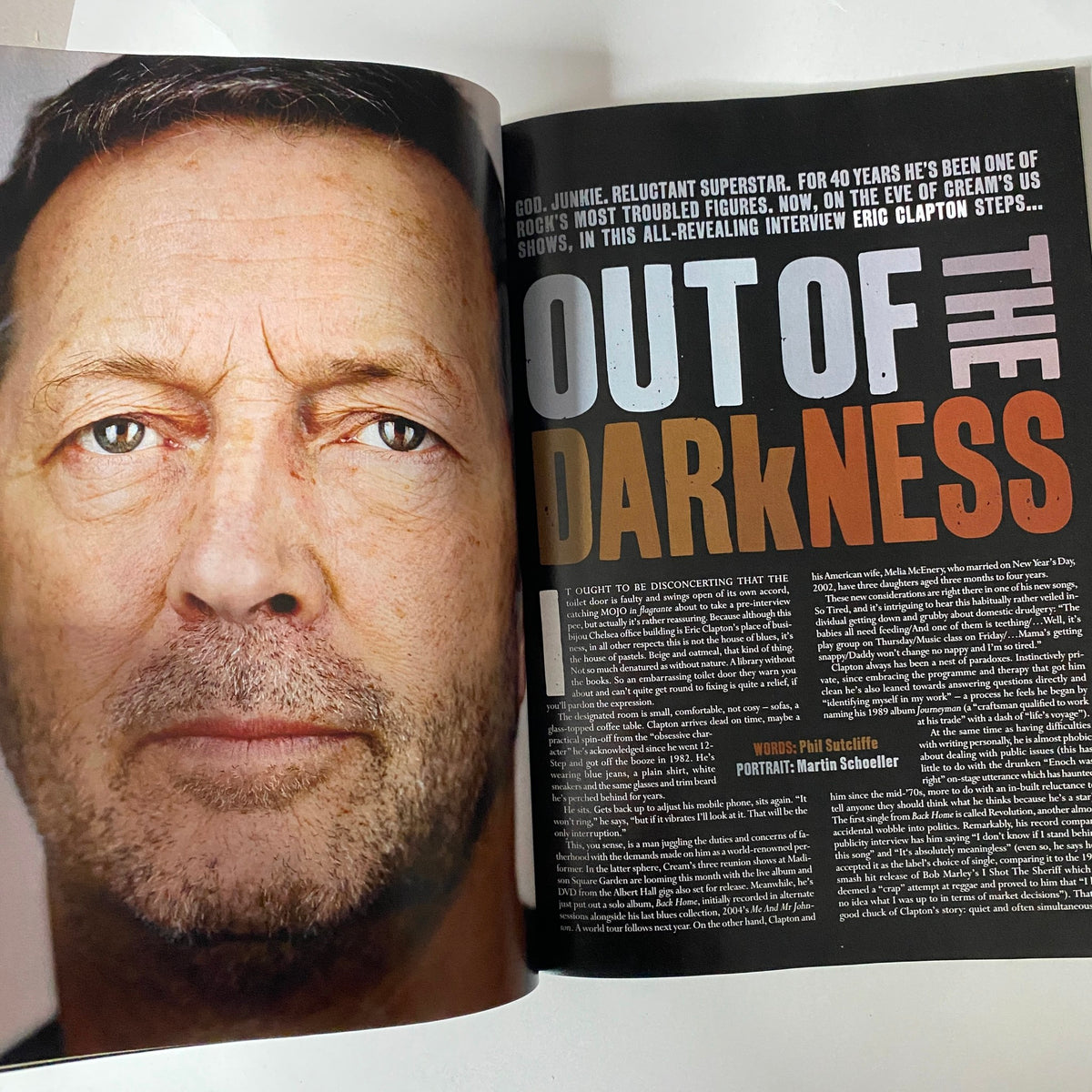Article titled 'Out of the Darkness' featuring Eric Clapton in Mojo Music Magazine November 2005, showcasing an intimate portrait and insights into his life and career.