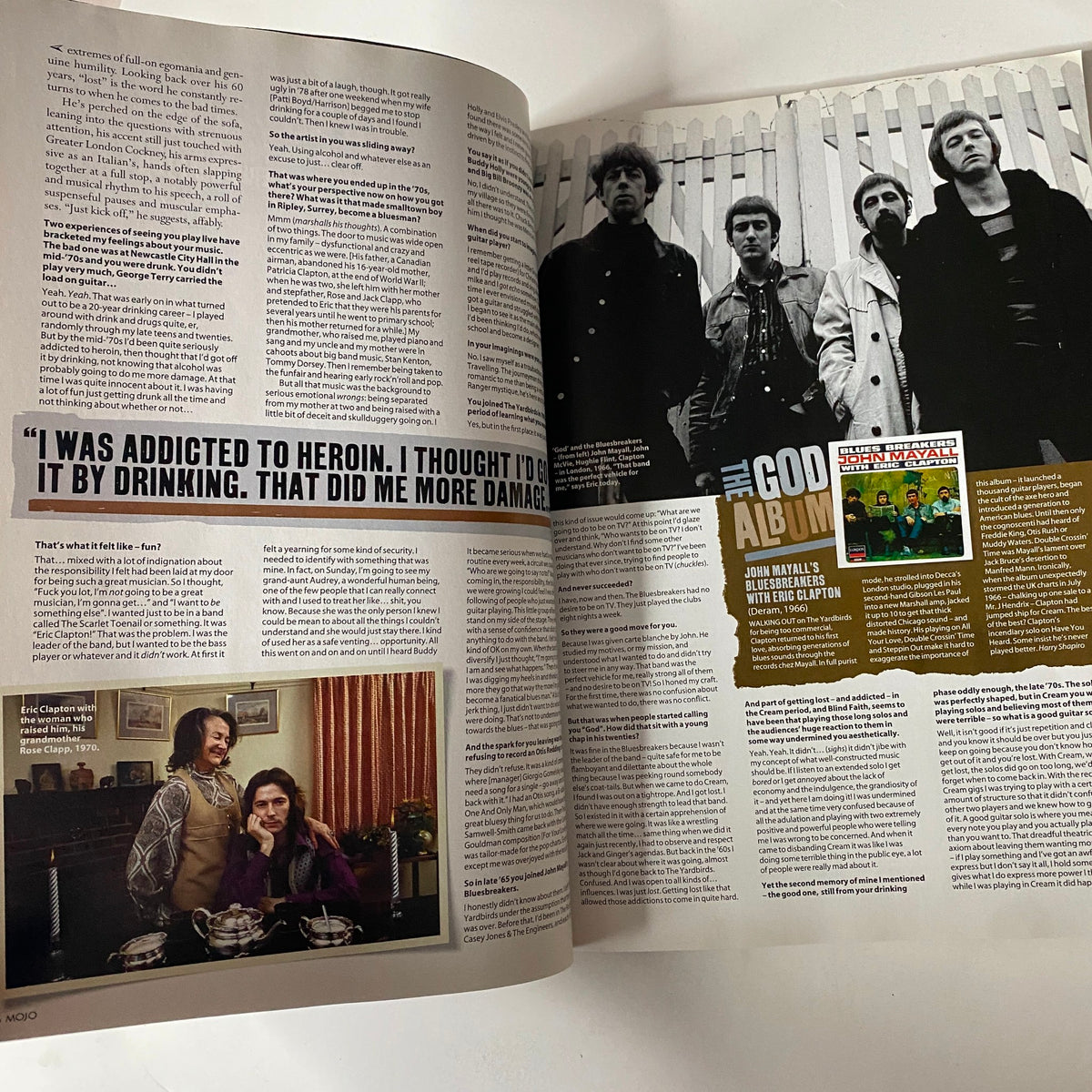 Inside spread of Mojo Music Magazine November 2005 featuring Eric Clapton, discussing his struggles with addiction and identity, with images of the band members and text highlighting quotes.