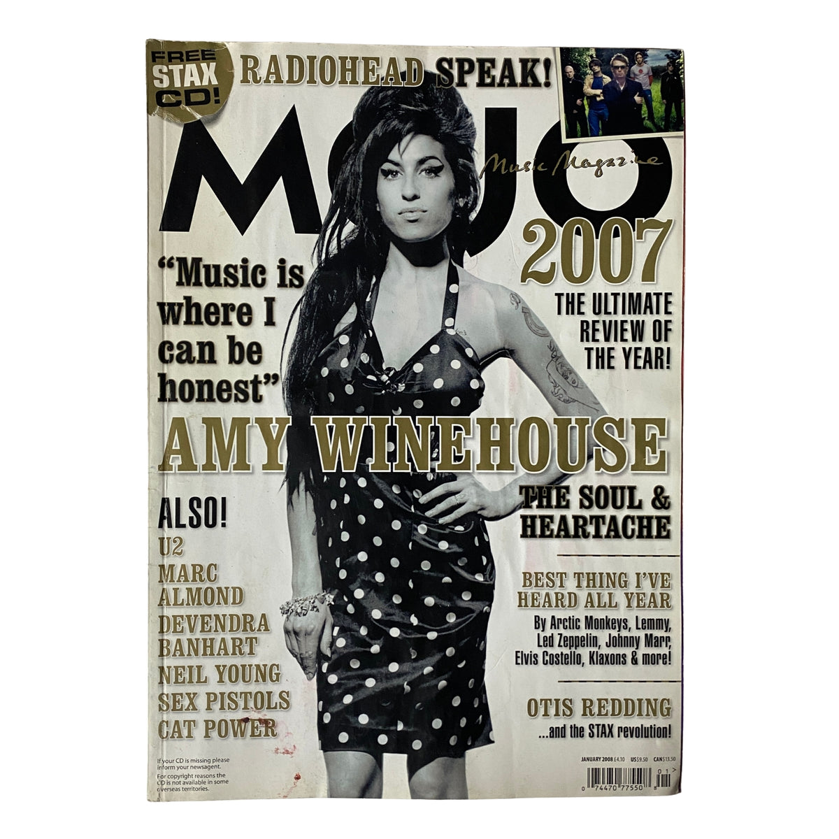 Mojo Music Magazine January 2008 featuring Amy Winehouse on the cover, showcasing her signature style with a polka dot dress, highlighting articles on soul music and notable features from the year.