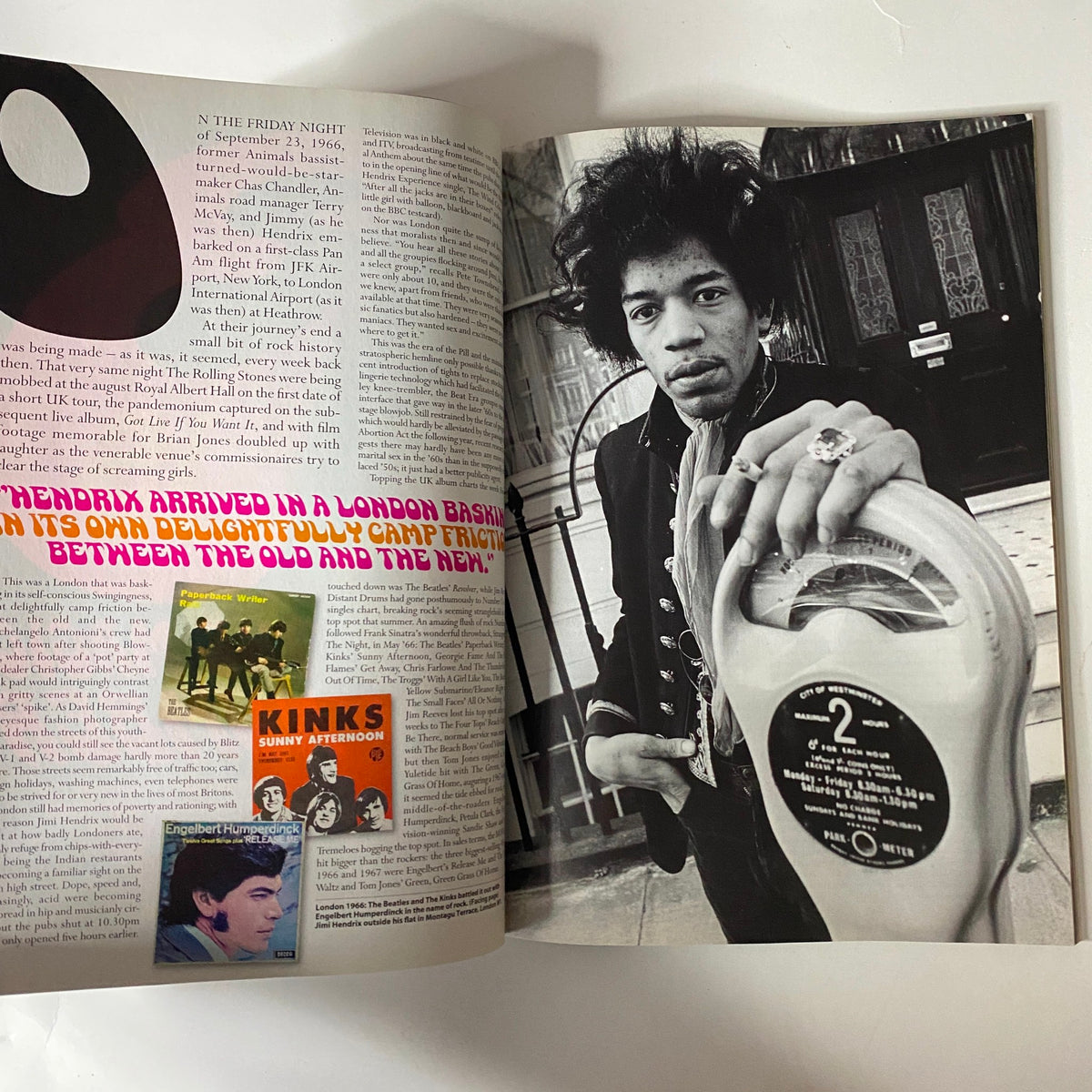 Mojo Music Magazine November 2006 Jimi Hendrix Cover featuring an article with Jimi Hendrix holding a record in London, emphasizing his cultural impact.