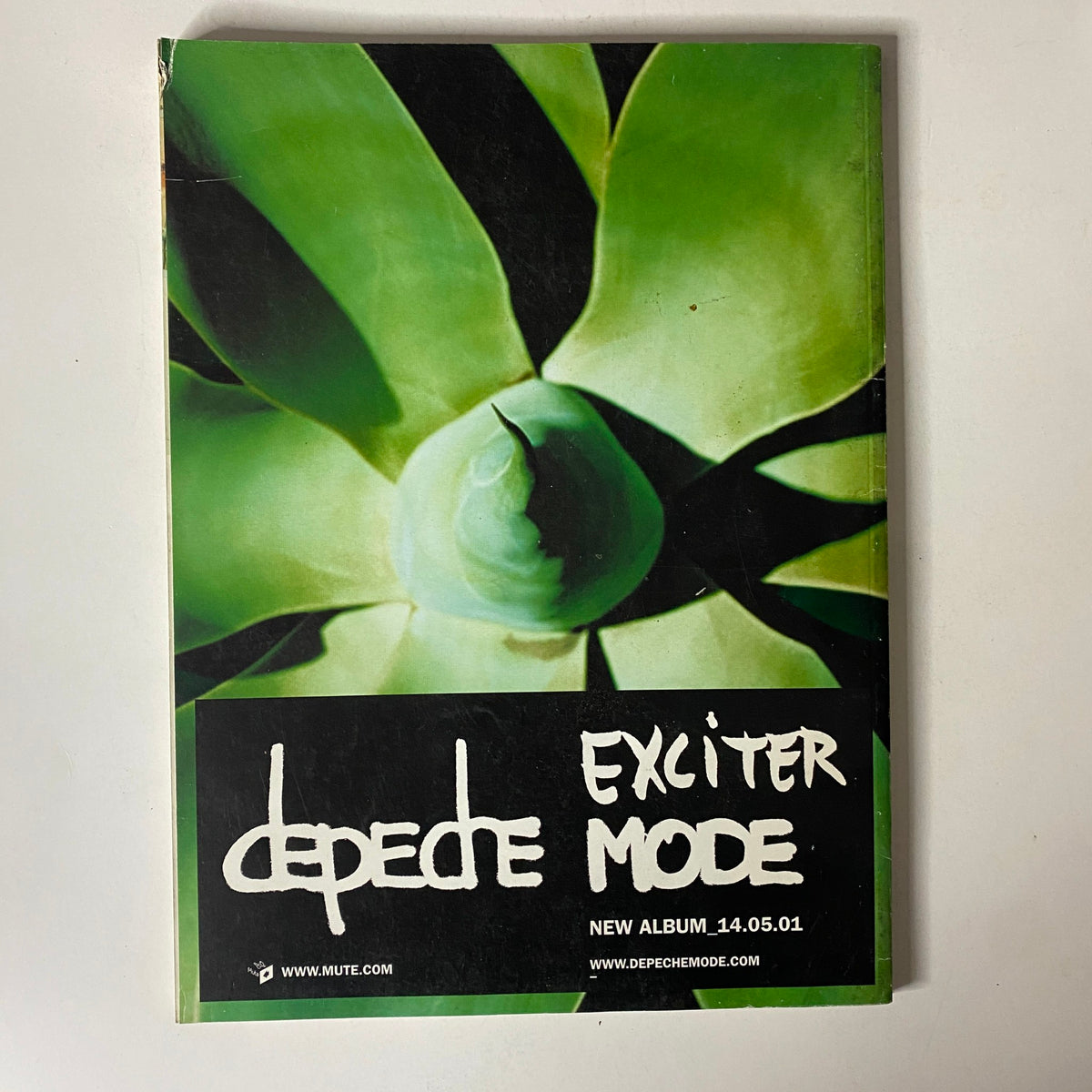 Cover of the Depedede Mode Exciter album promotional piece included in Mojo Music Magazine June 2001, highlighting the new album.