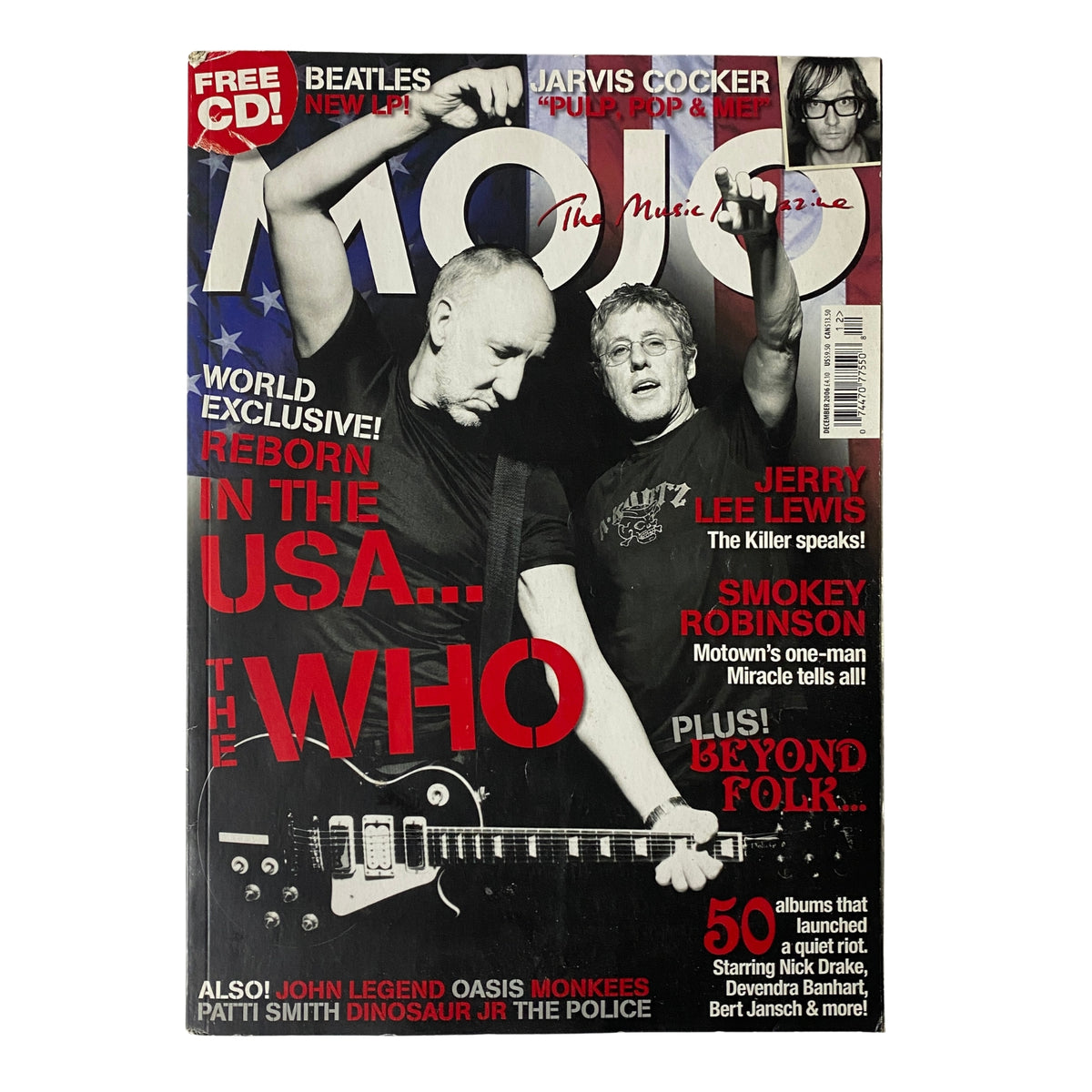 Mojo Music Magazine December 2006 featuring Jerry Lee Lewis on the cover, showcasing an iconic image with striking visuals and bold text. No CD included, in good condition with a protective cover.