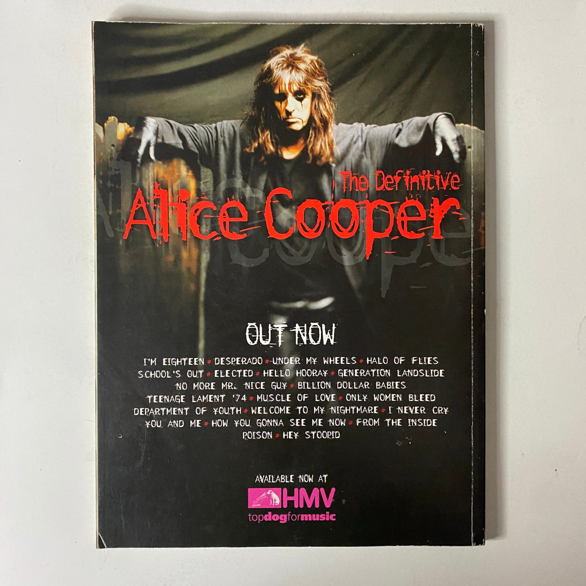 Mojo Music Magazine March 2001 Genesis Cover back page promoting Alice Cooper's album releases, illustrating the intersection of rock legends in a vintage magazine context.