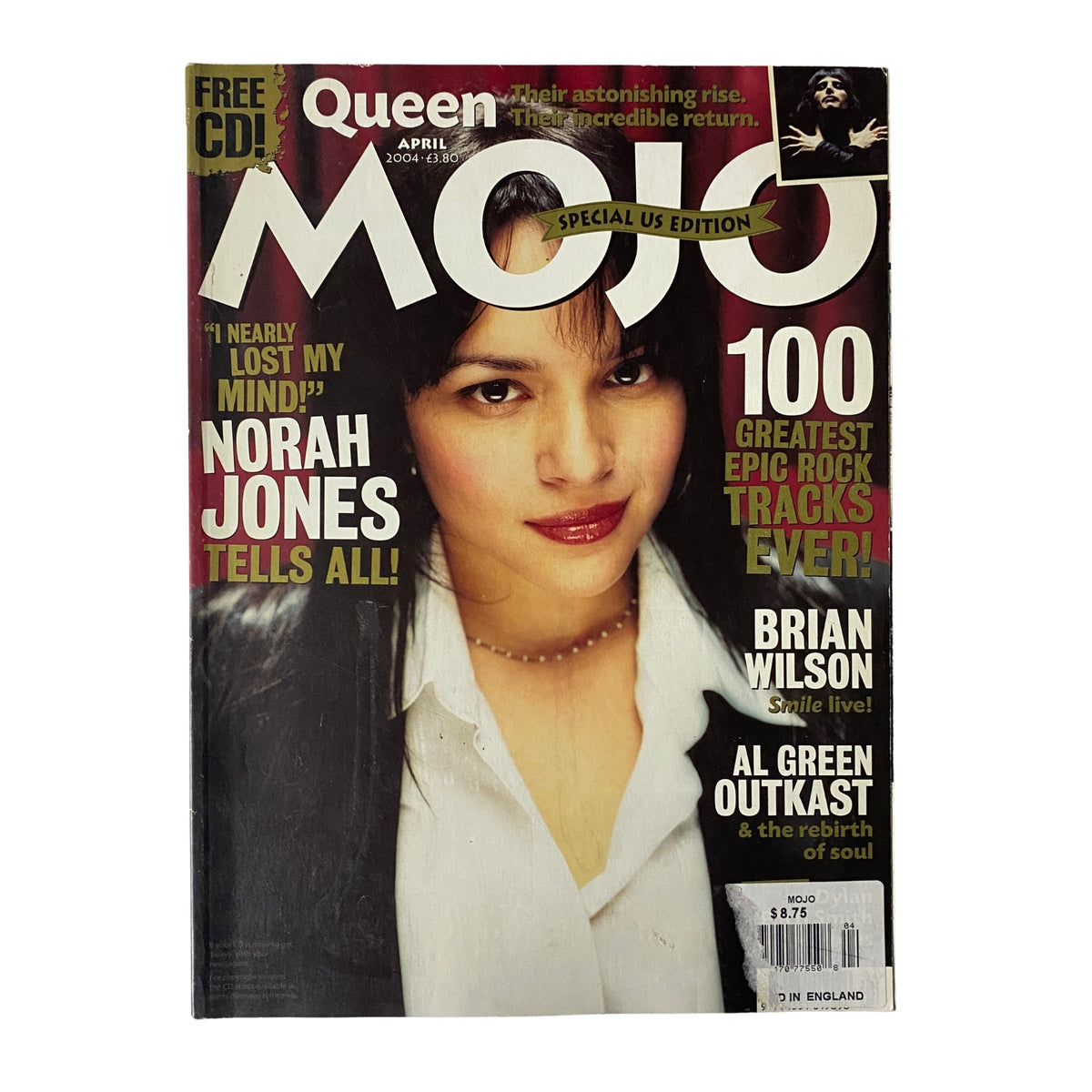 Mojo Music Magazine April 2004 featuring Norah Jones on the cover, highlighting her rise to fame with an insightful musical editorial. The magazine is in very good condition, and includes a protective cover.