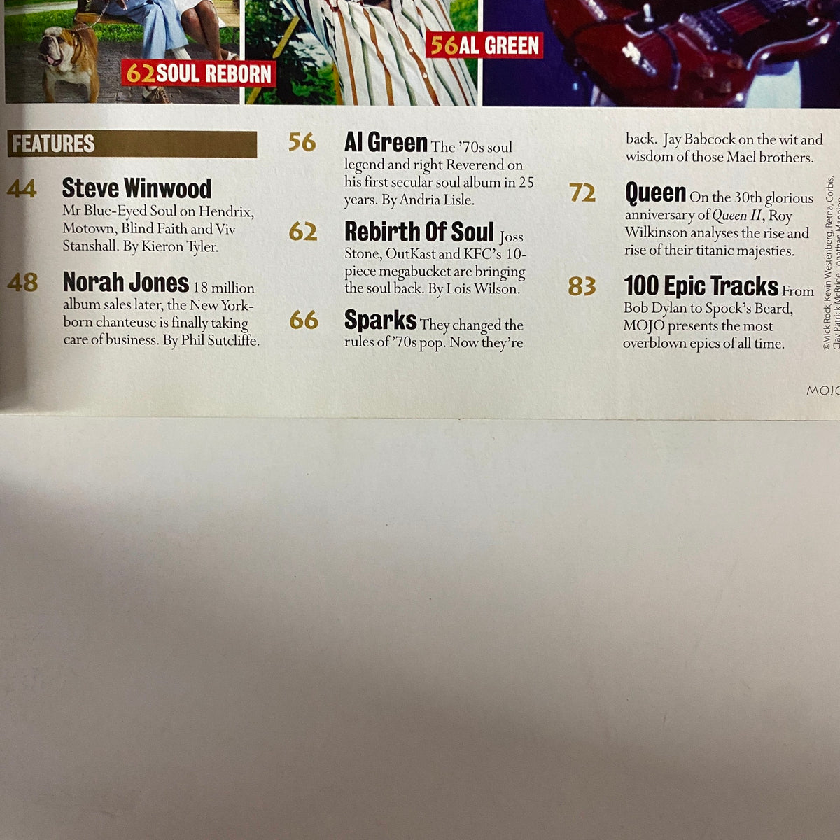 Mojo Music Magazine April 2004 featuring Norah Jones on page 48, highlighting her feature article alongside other artists including Steve Winwood and Al Green. This magazine edition captures essential music insights for collectors.