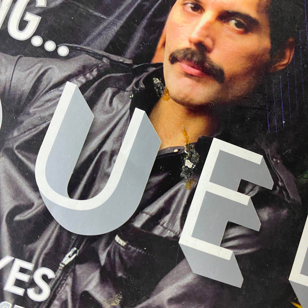 Close-up of Mojo Music Magazine October 2008 cover emphasizing the title 'QUEEN'. The magazine discusses Queen’s legacy and insights from band members.