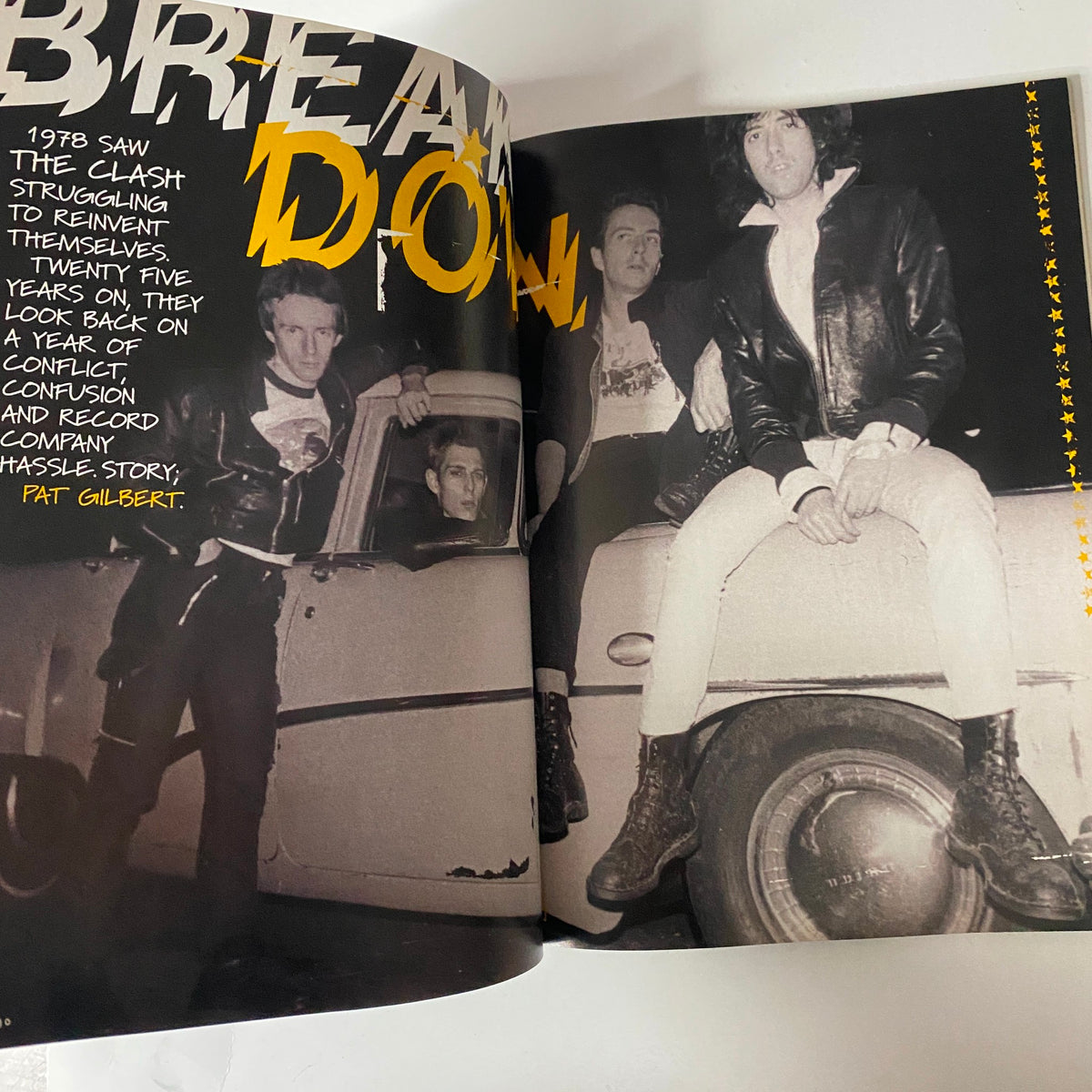 Inside The Clash feature from Mojo Music Magazine March 2003 showcasing iconic band members in a vintage photograph.