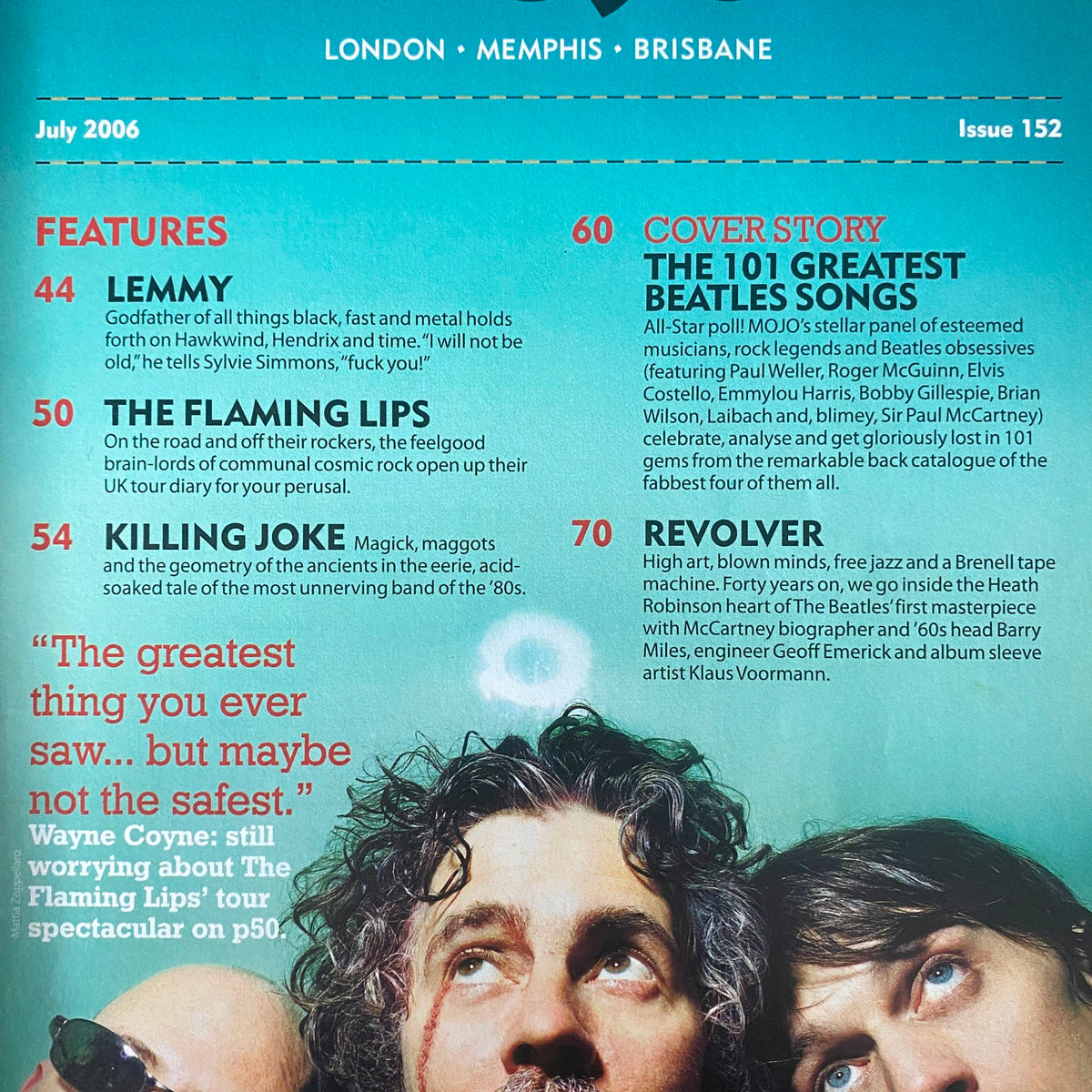 Inside pages of Mojo Music Magazine July 2006 highlighting features on Lemmy, The Flaming Lips, and The Beatles' 101 Greatest Songs.