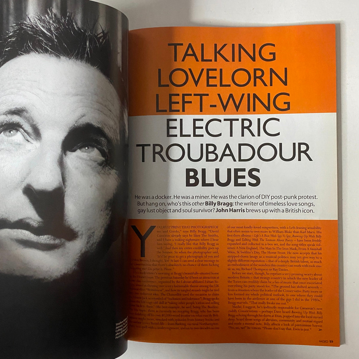 Feature article in Mojo Music Magazine April 2006, showcasing Billy Bragg with a focus on his musical career and influence.
