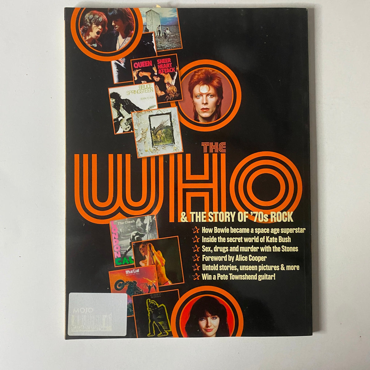 Cover of the Mojo Classic Magazine June 2006, titled 'The Who & The Story of ’70s Rock', featuring a collage of rock icons like David Bowie and Queen, along with a promotion for a Pete Townshend guitar prize.
