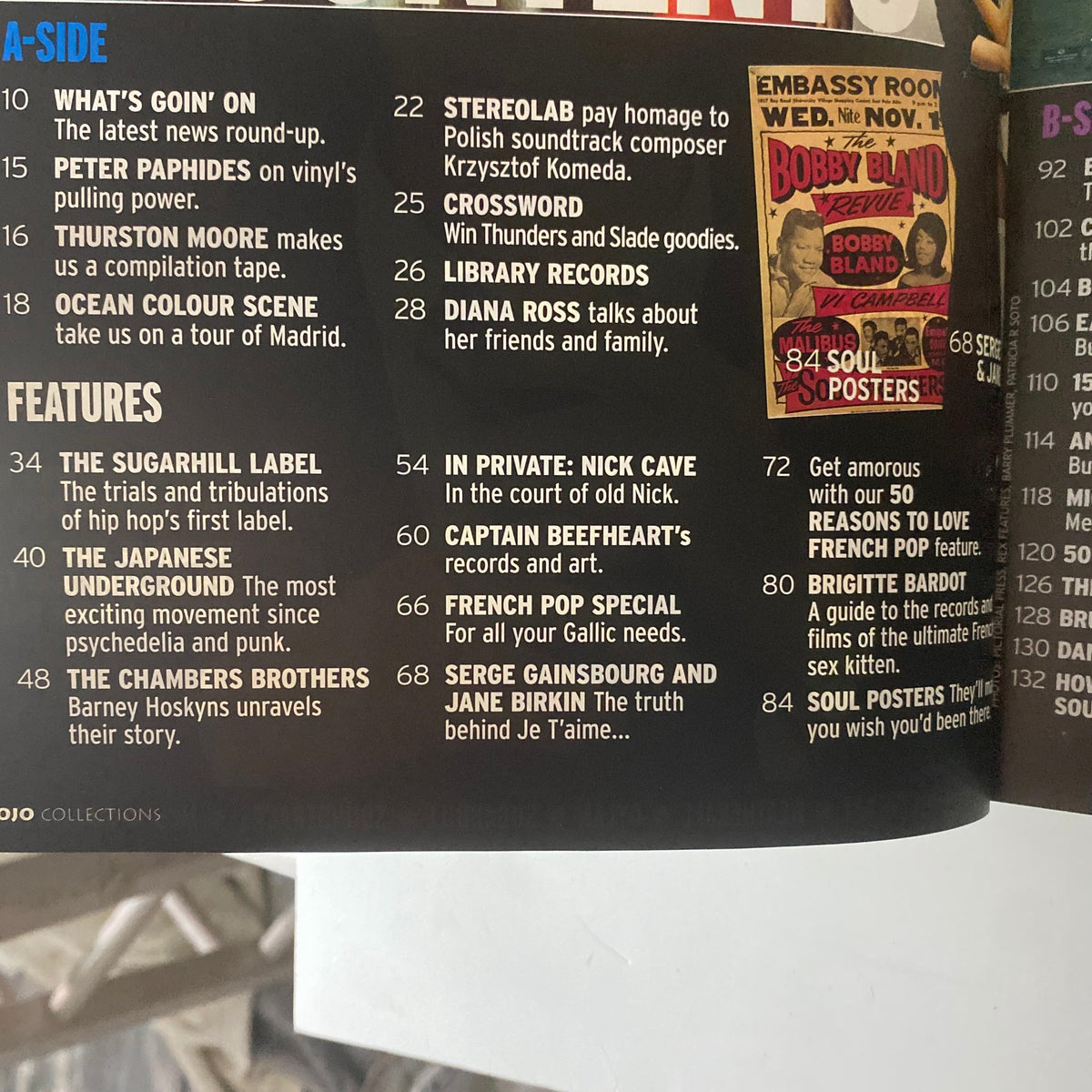 Inside pages of Mojo Collections Magazine Winter 2001 showcasing various editorial features including Nick Cave's private obsessions and topics like French pop music.