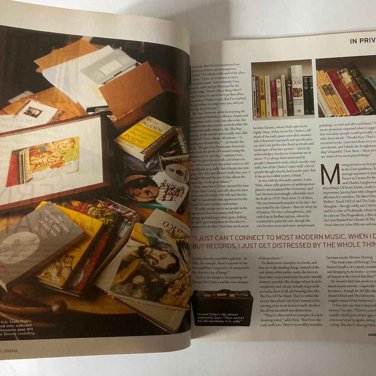 Another interior page of Mojo Collections Magazine Winter 2001 focusing on Nick Cave's private collection, depicting various records and books.